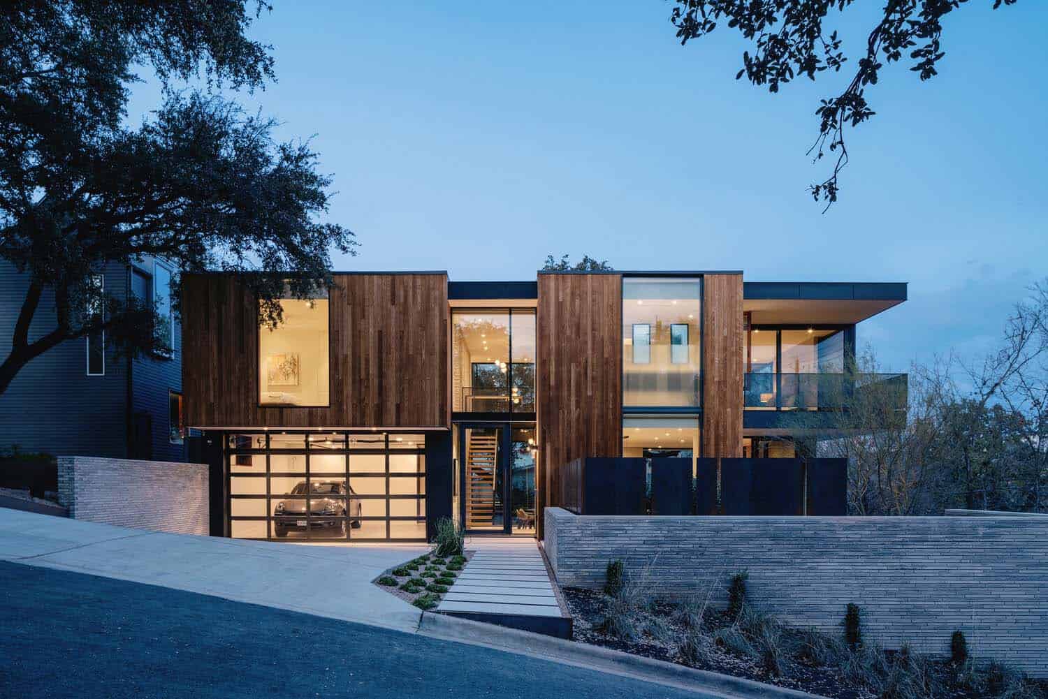 modern house exterior at dusk from the street view