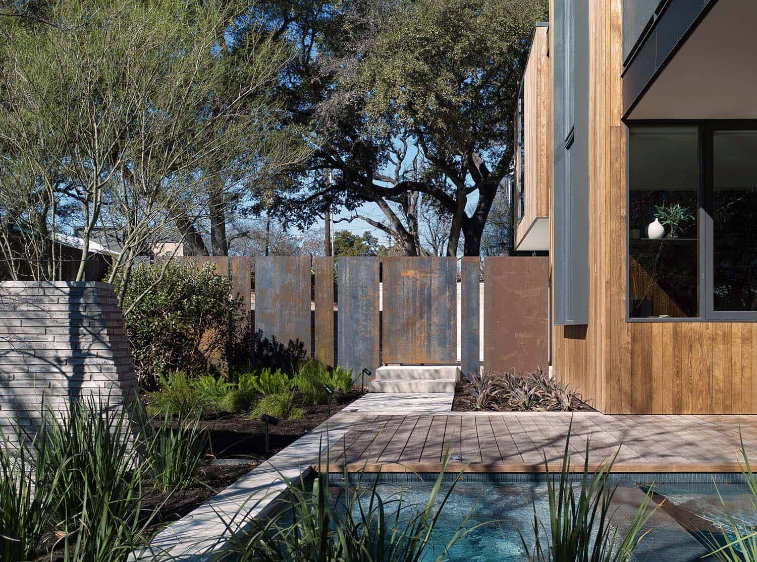 modern home backyard patio and lap pool