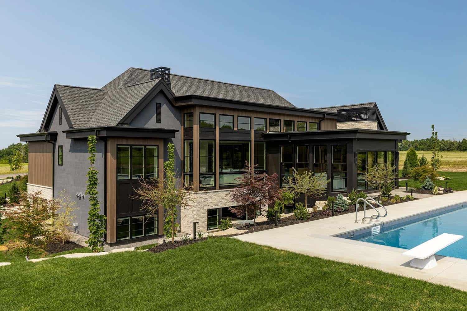 modern rambler home exterior backyard view