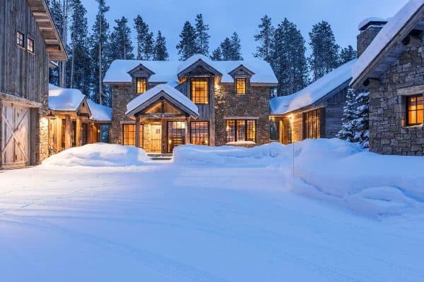 featured posts image for A cozy cabin in the woods of Montana offers a peaceful snowy getaway