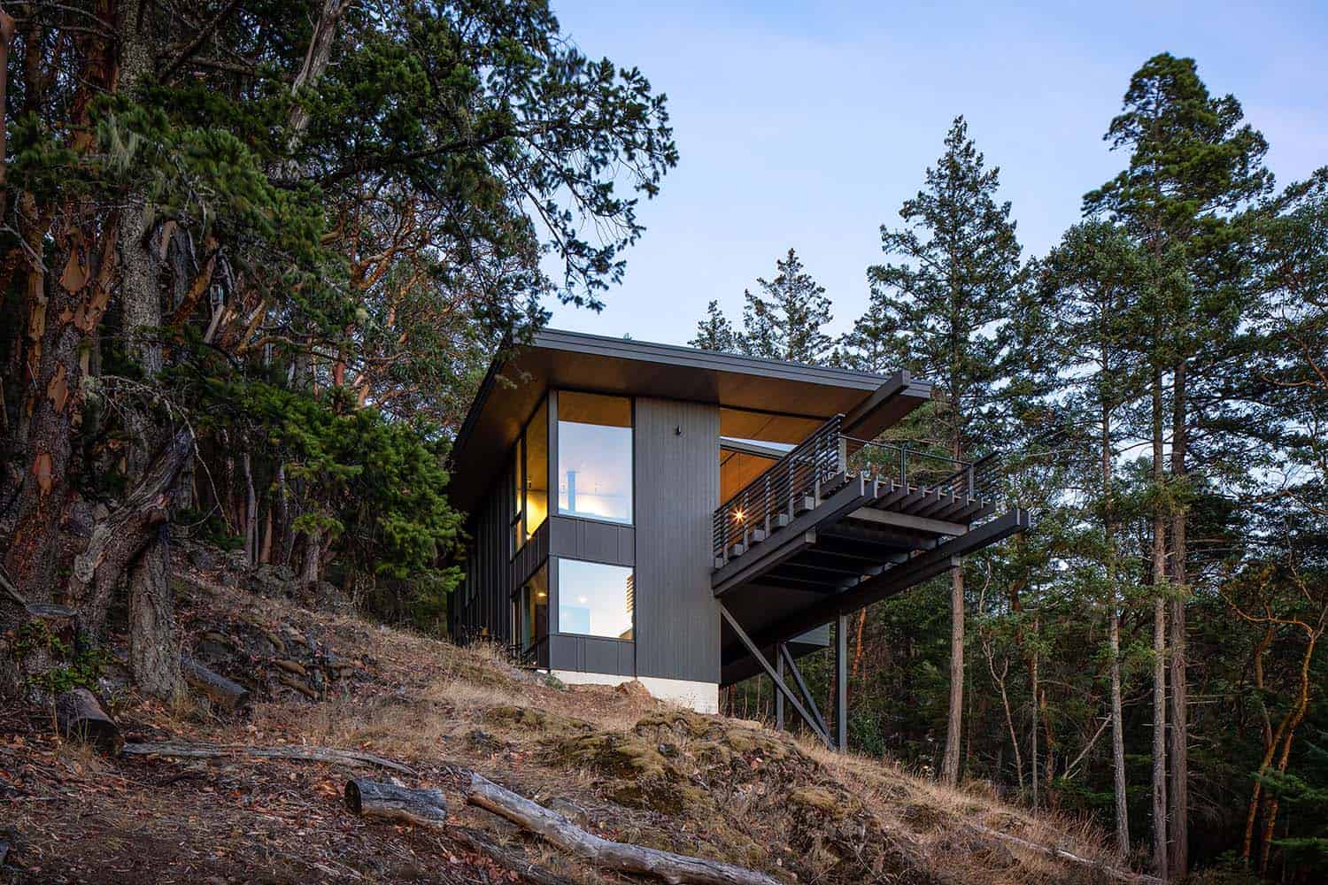 contemporary mountain cabin exterior at dusk