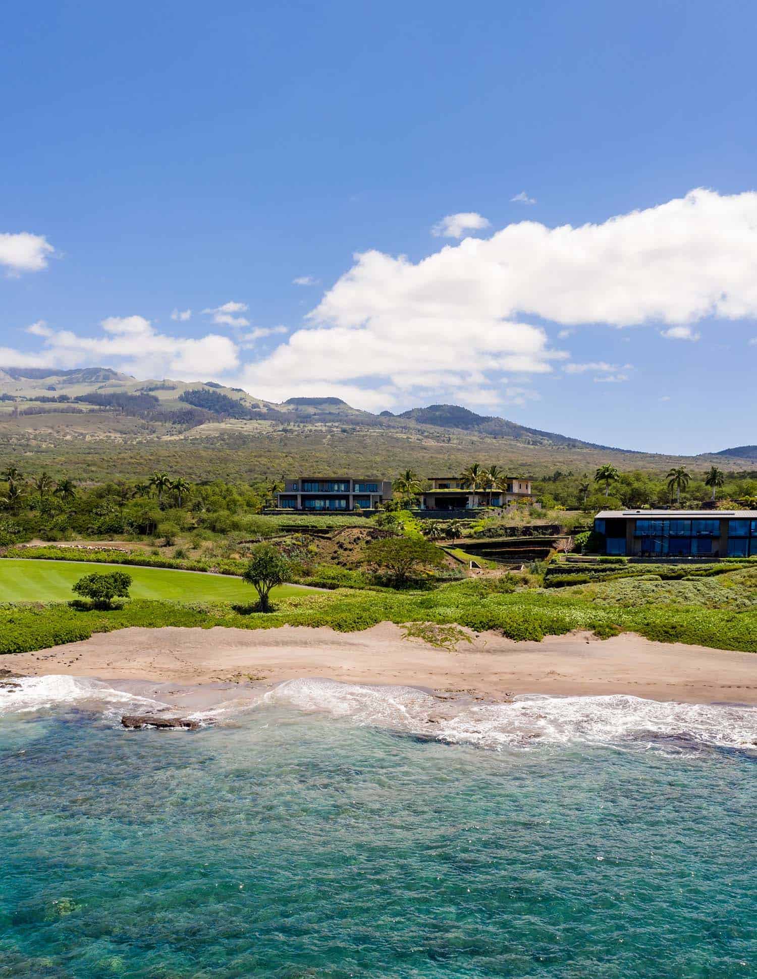 contemporary beach house exterior aerial view from the ocean