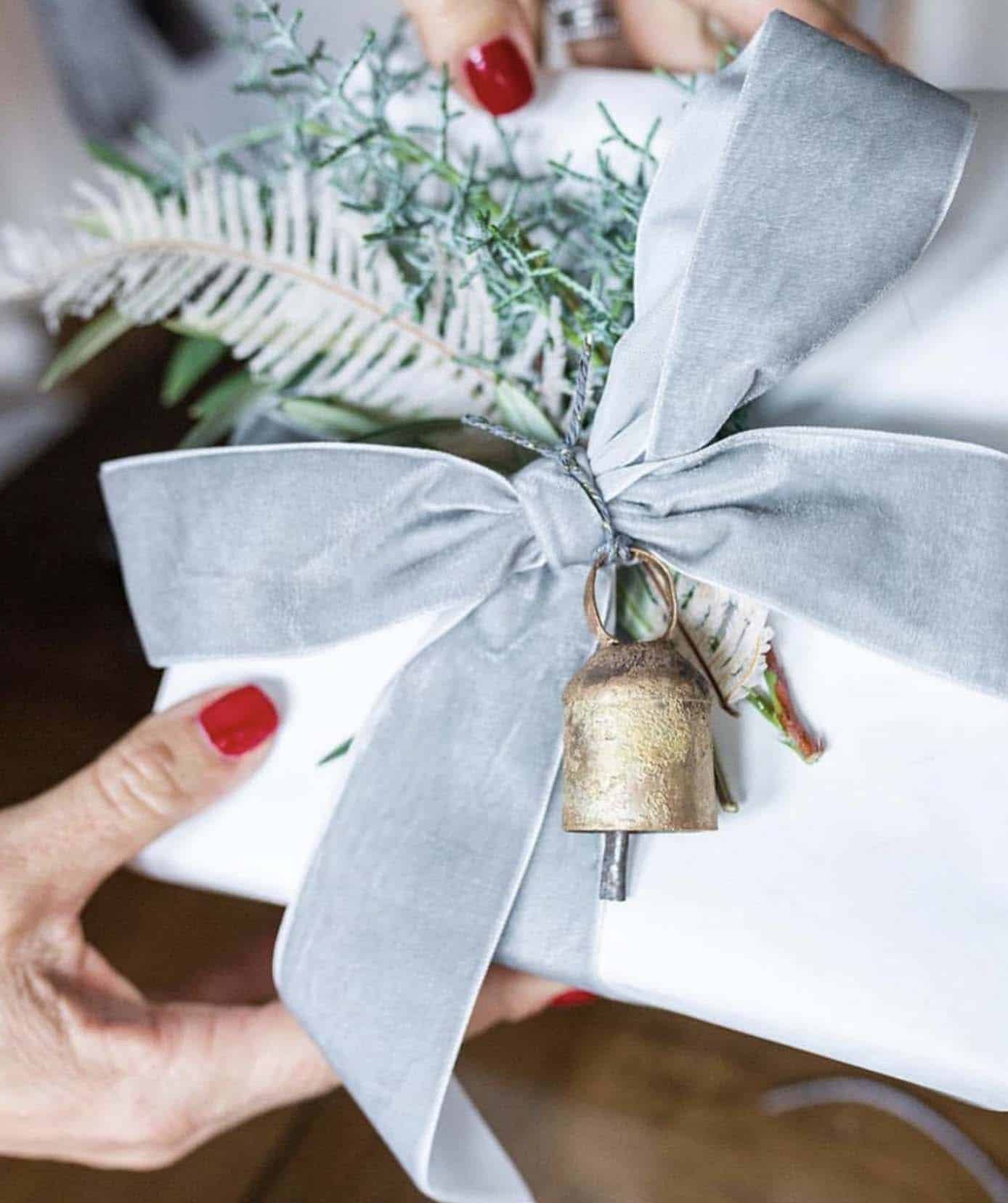 christmas presents with fresh greenery