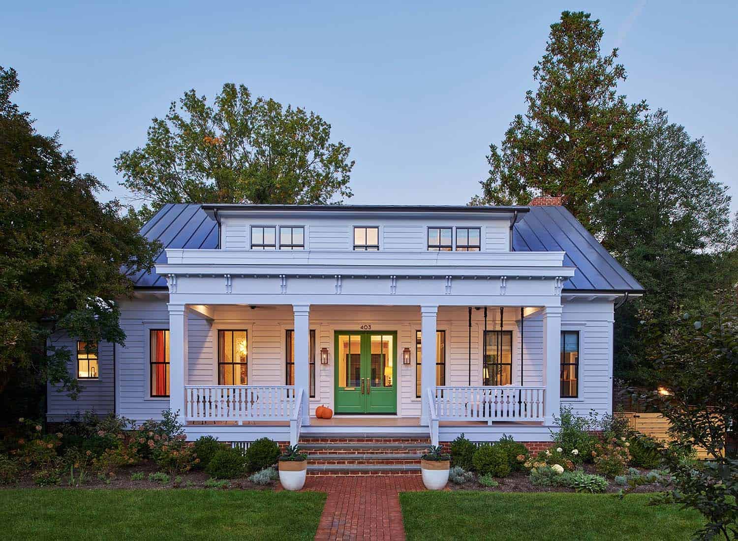 Italianate bungalow exterior at dusk