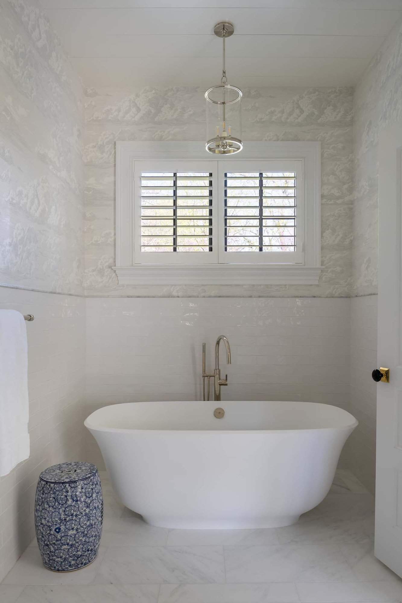 contemporary bathroom with a freestanding tub