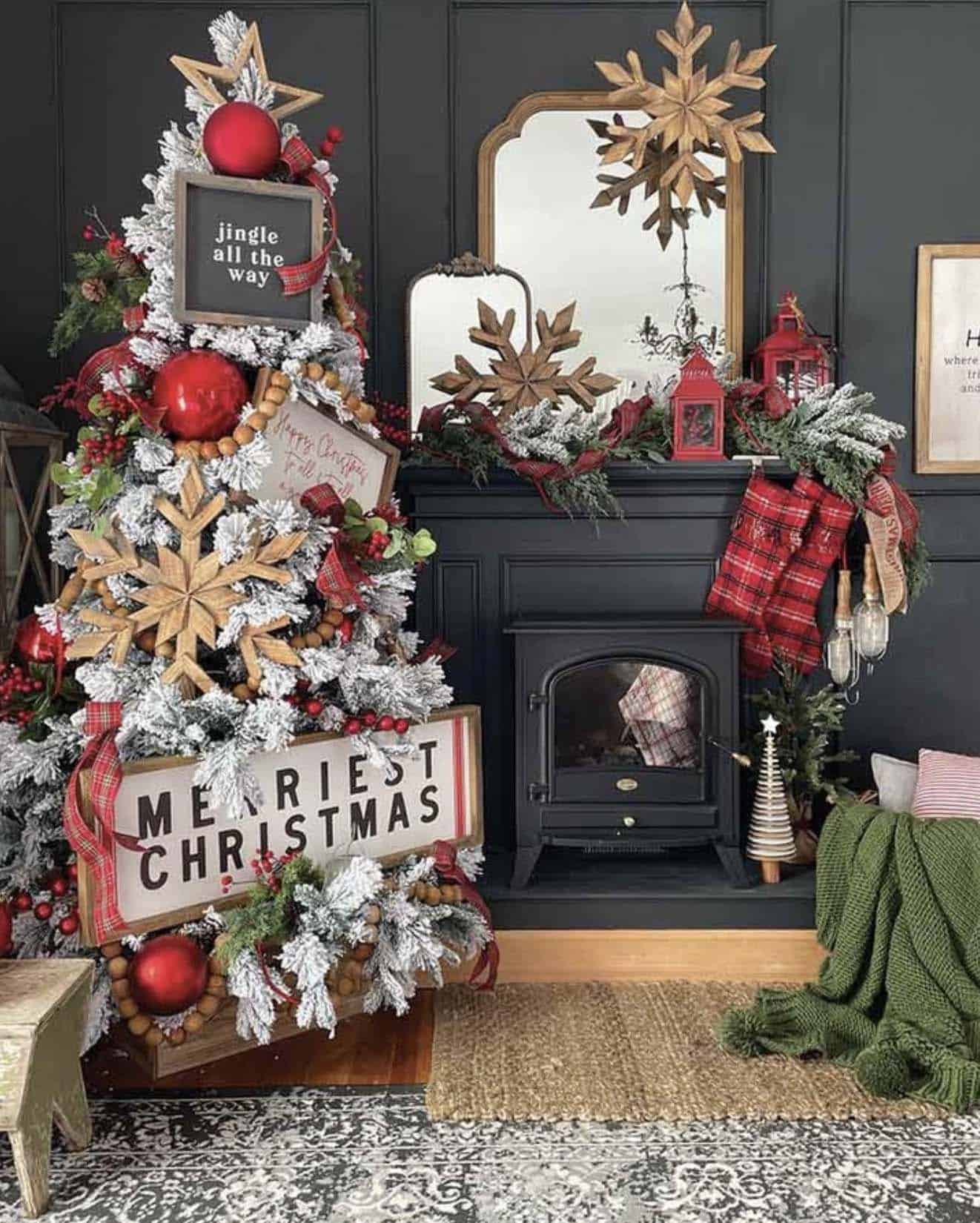 living room with a christmas tree and a fireplace