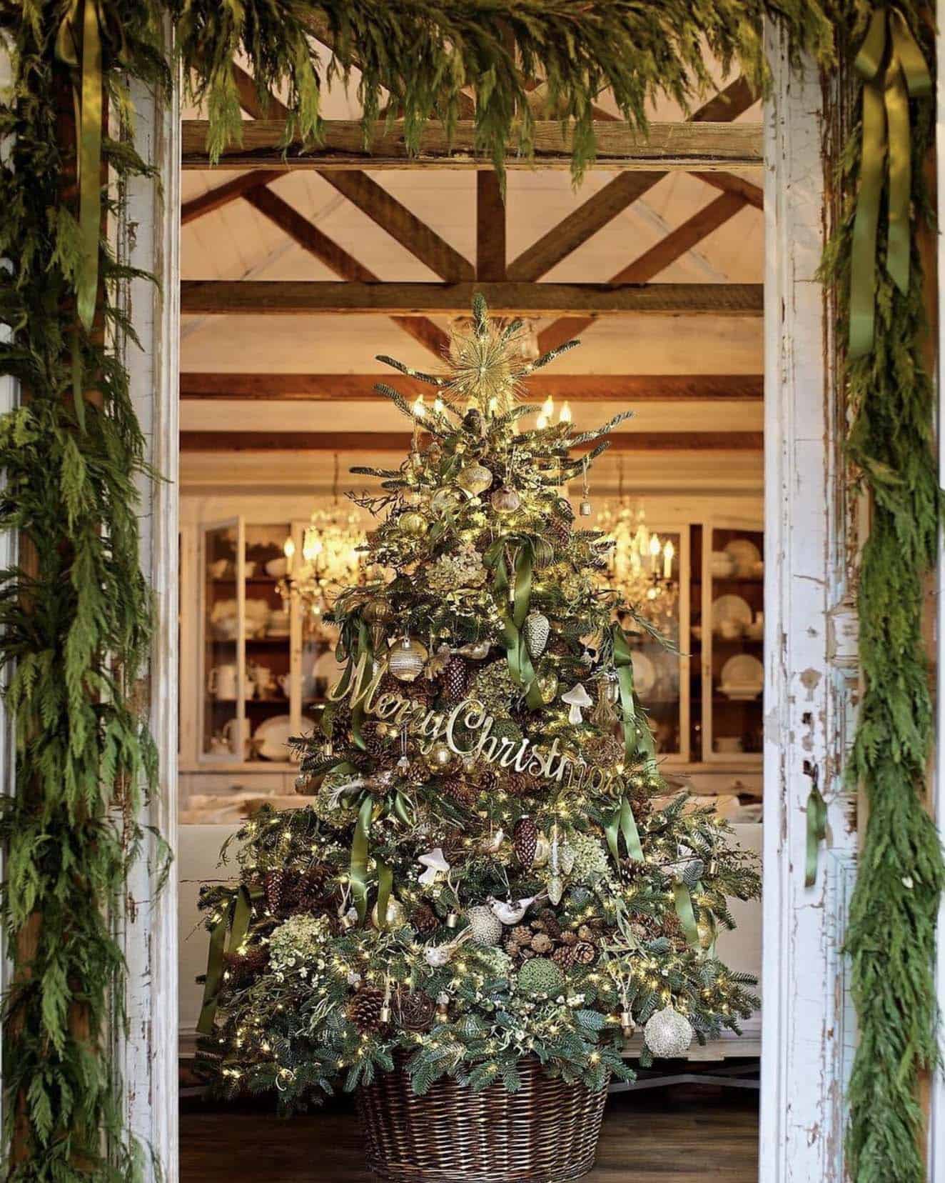 a merry and bright entry christmas tree with a star topper