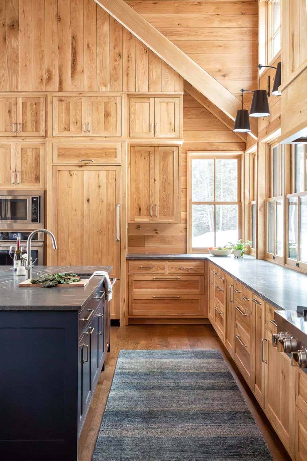 modern rustic kitchen with a blue painted island