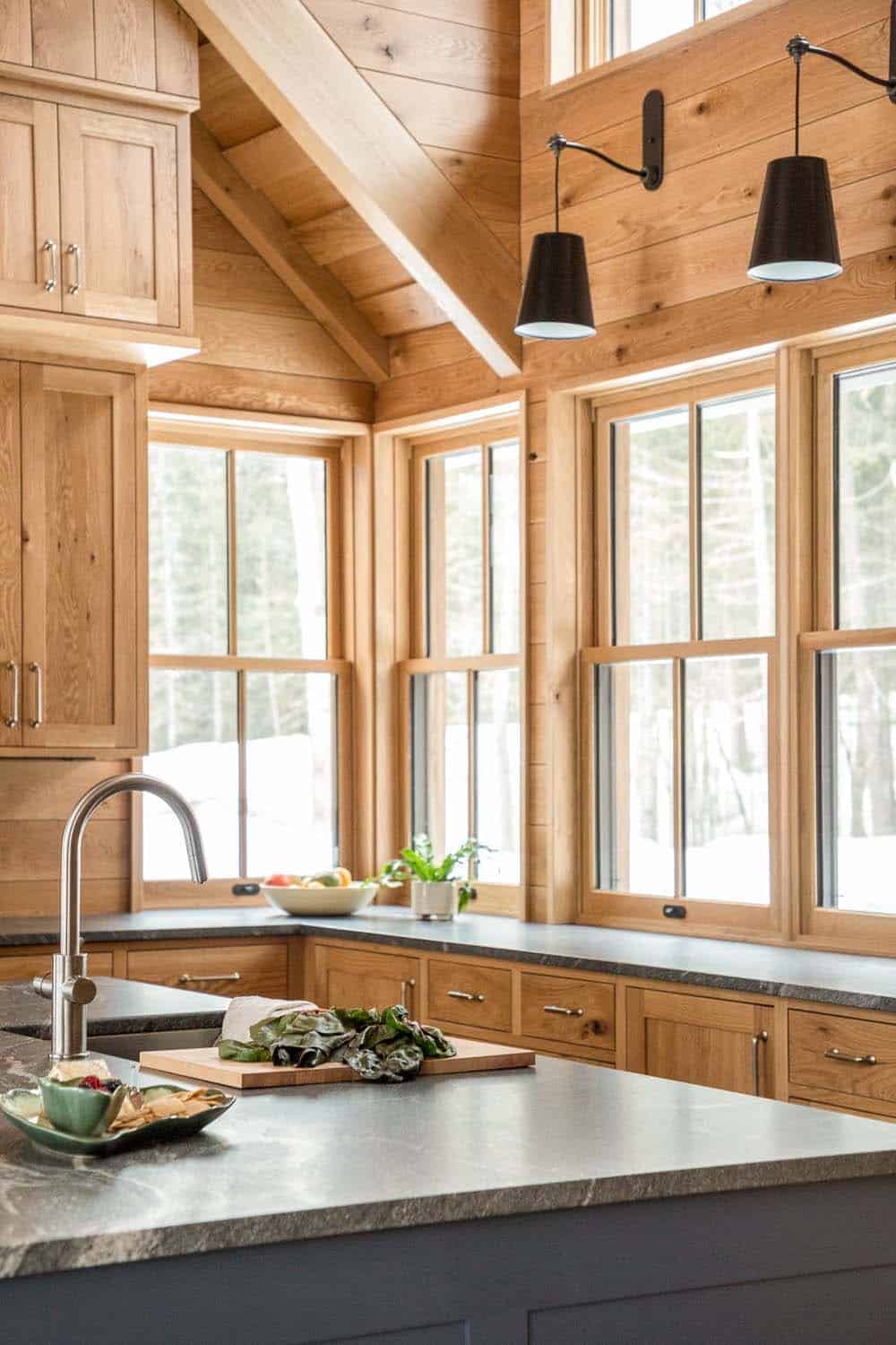 modern rustic kitchen with a blue painted island