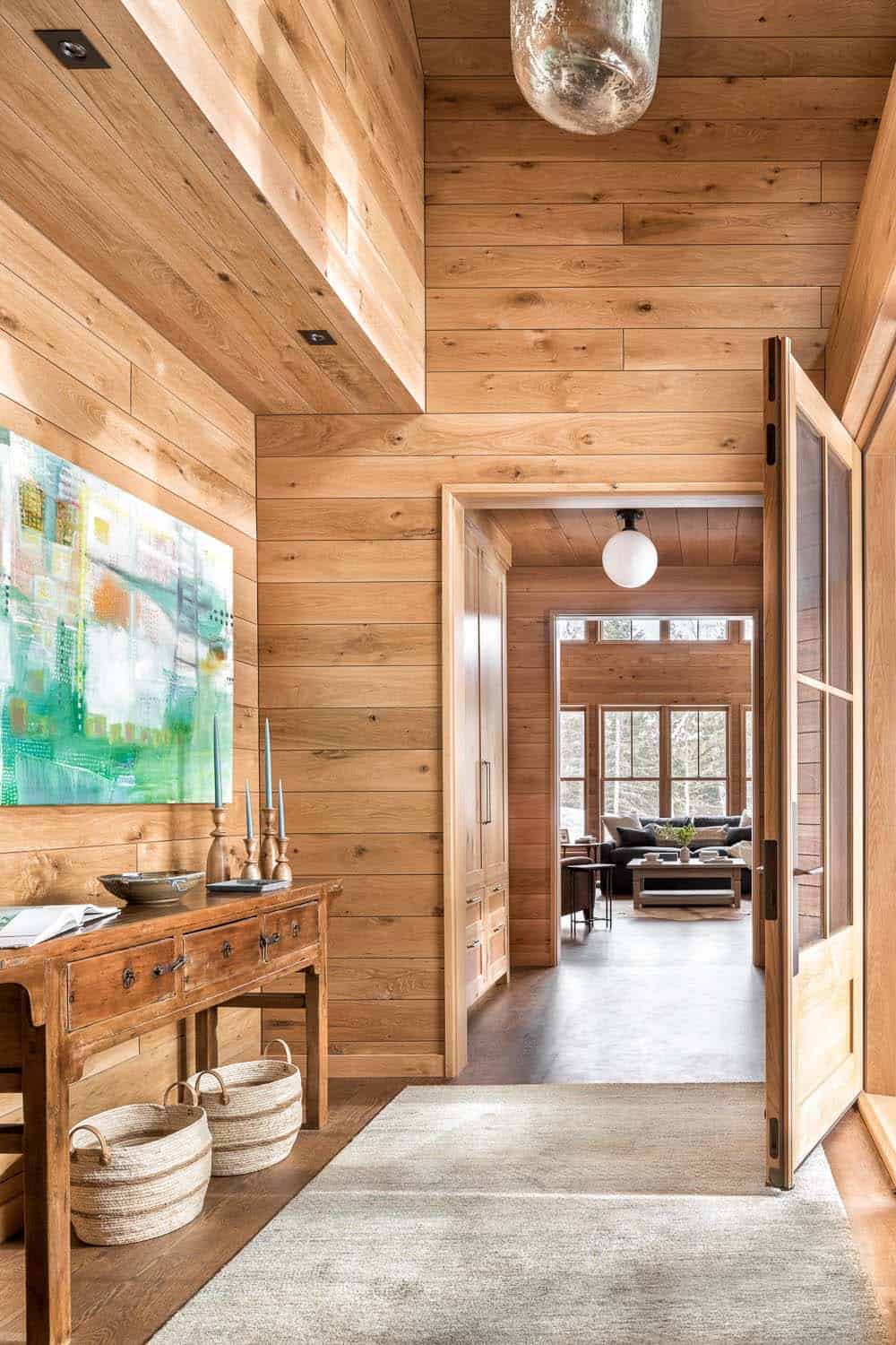 modern rustic mountain home entry with a console table