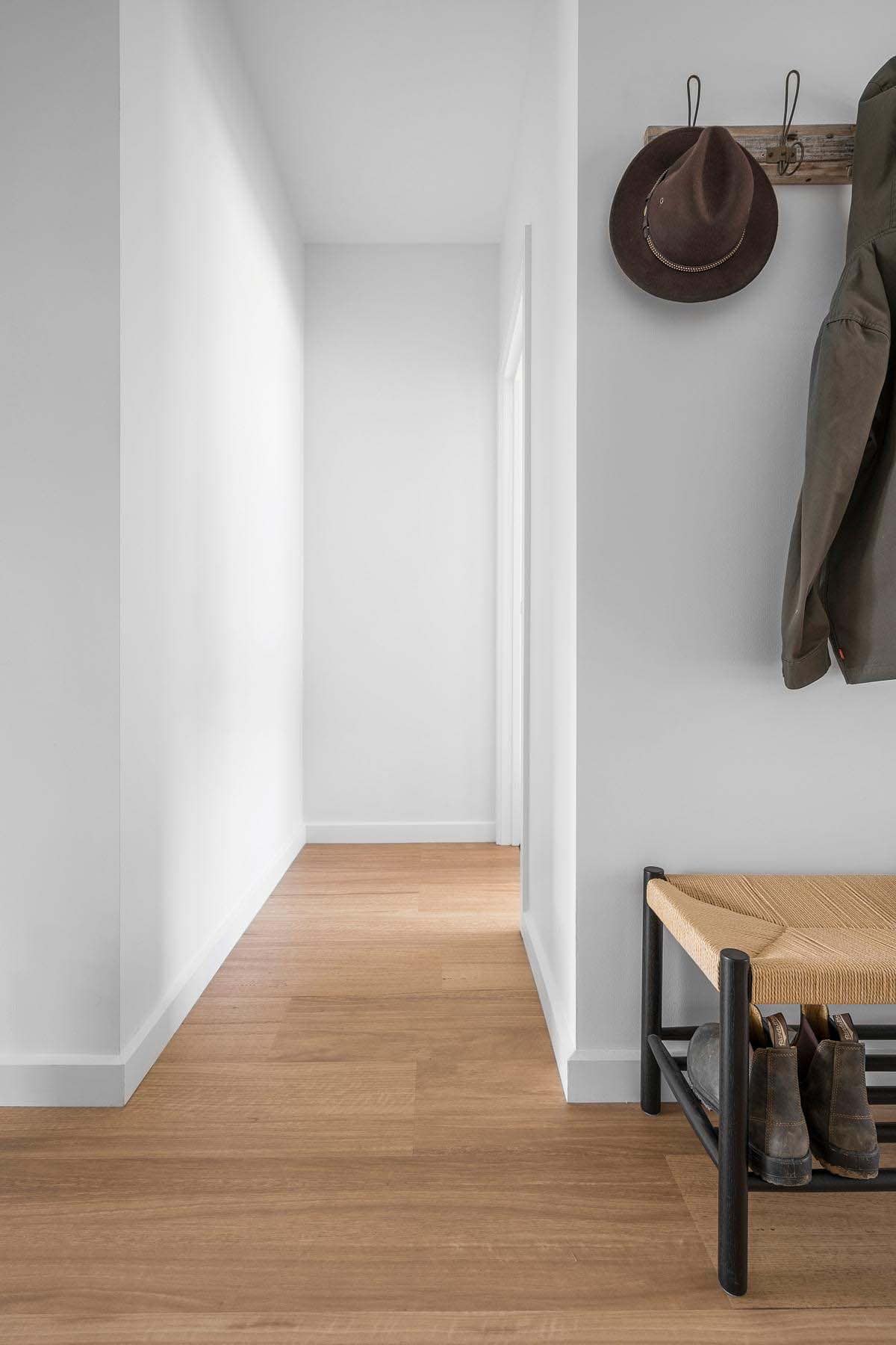 Scandinavian alpine style home entry with a bench