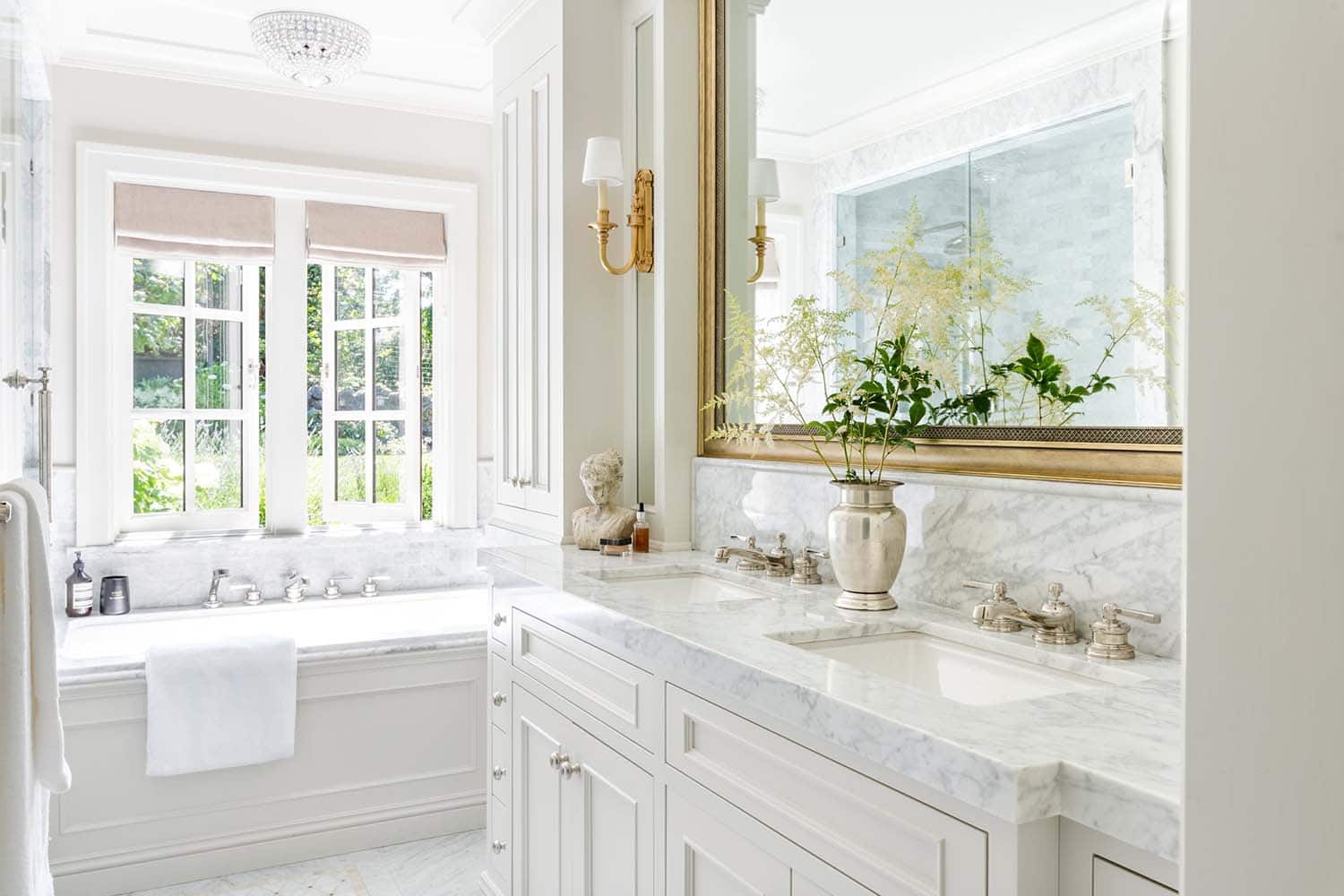 traditional bathroom with a vanity and tub