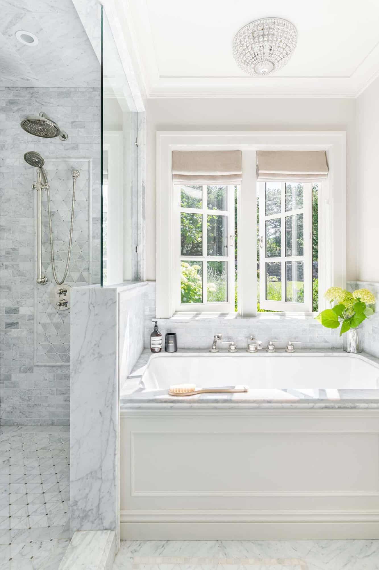 traditional bathroom with a tub and shower