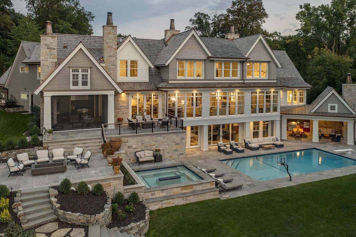 modern lake house exterior with a pool