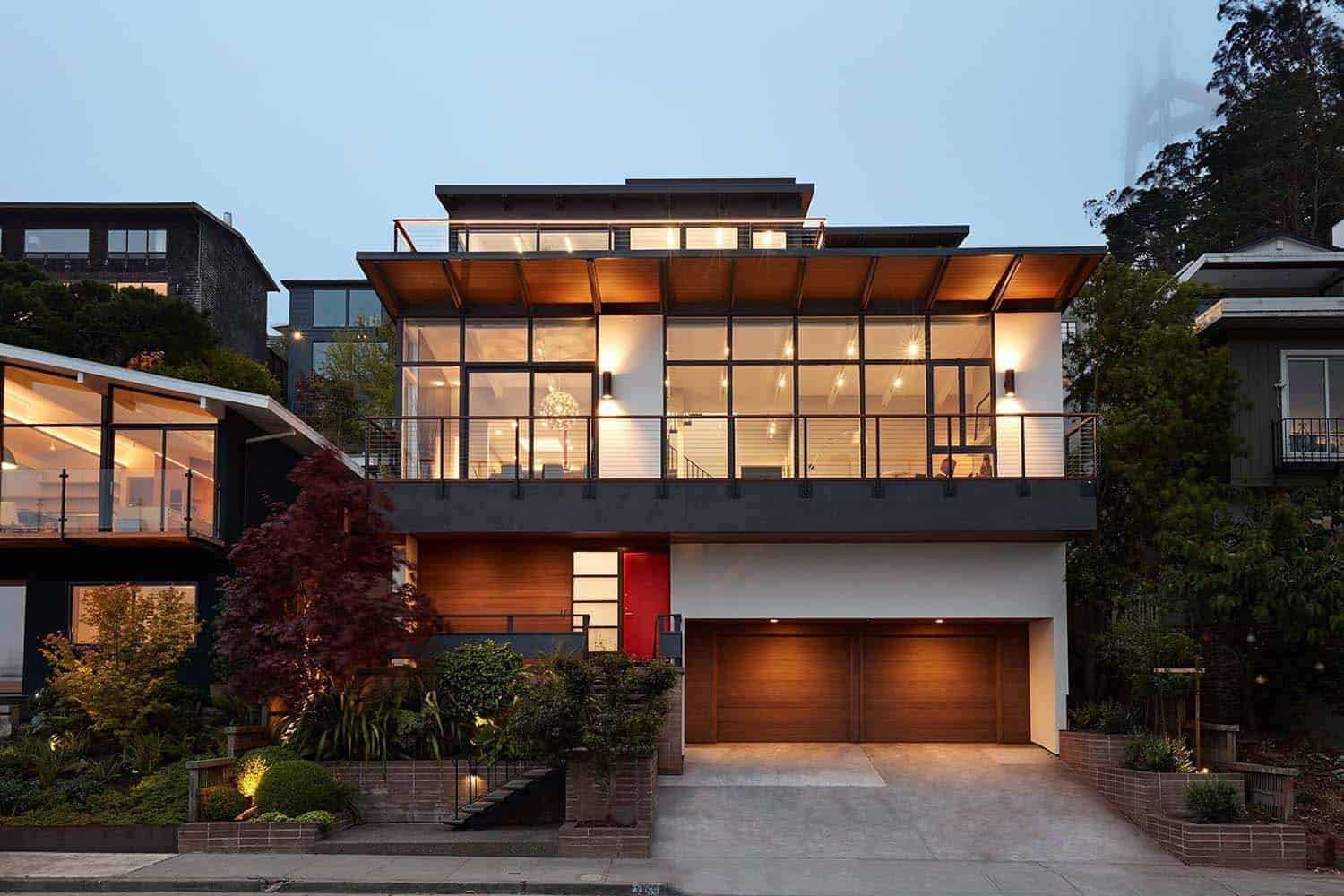 midcentury modern house exterior at dusk