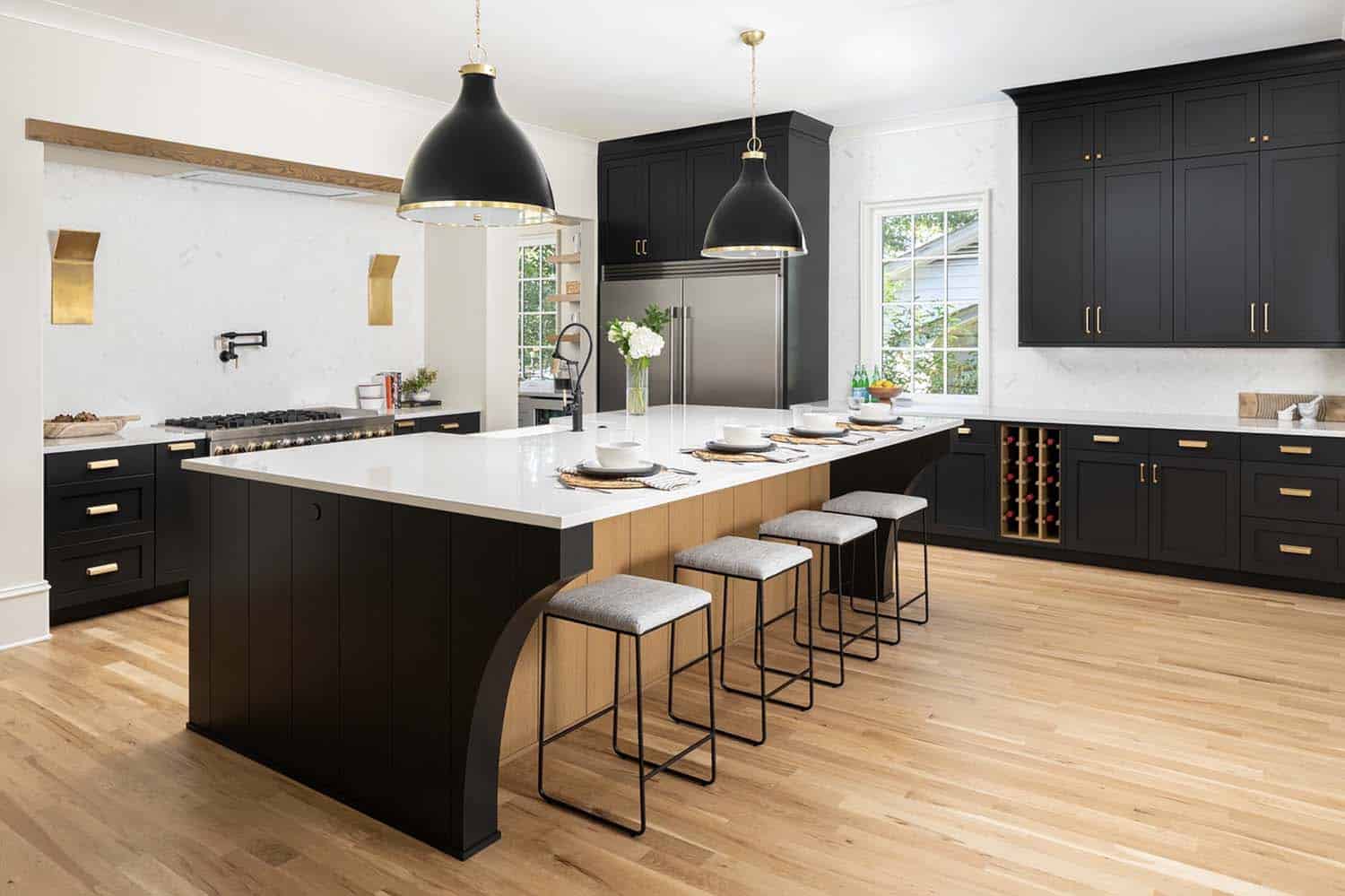 contemporary kitchen with a large island and pendant lights