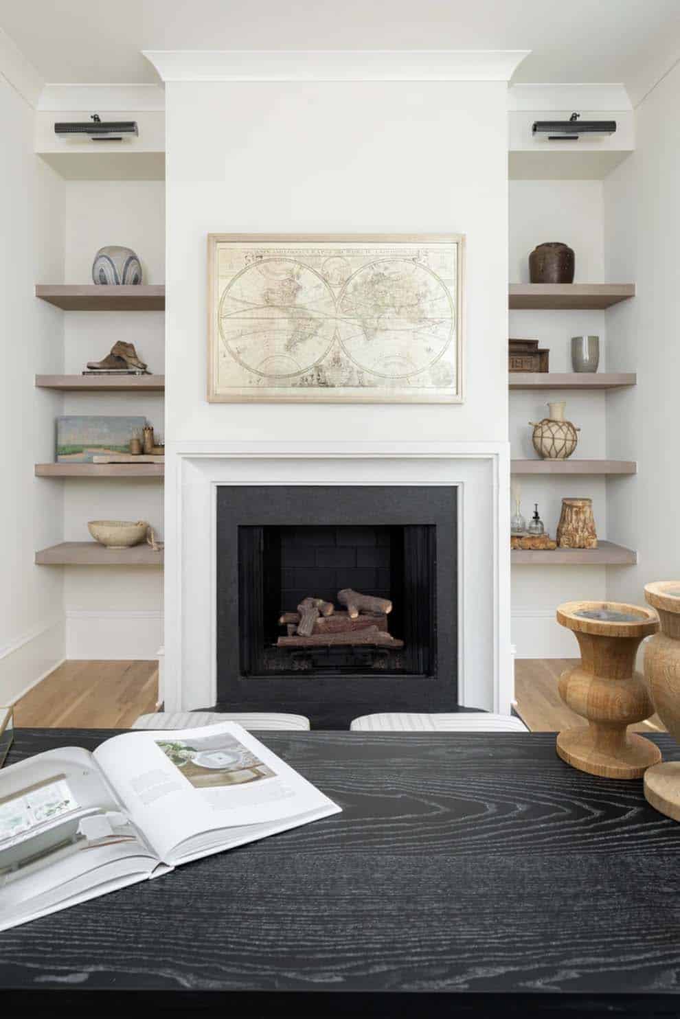 contemporary home office with a fireplace