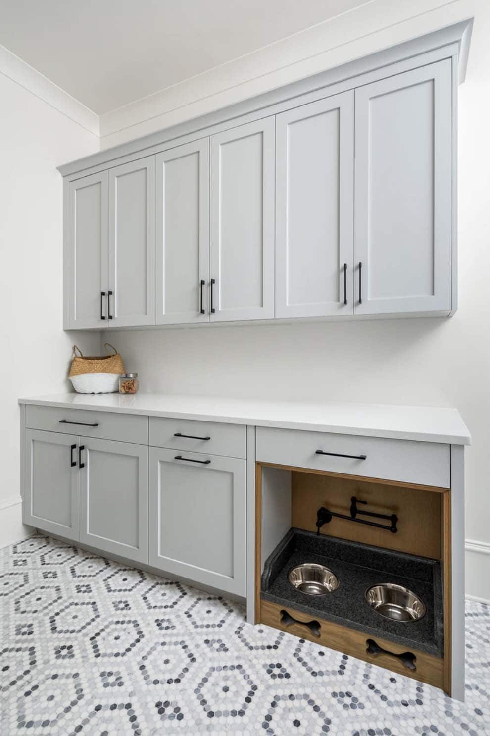 contemporary mudroom with a dog feeding station