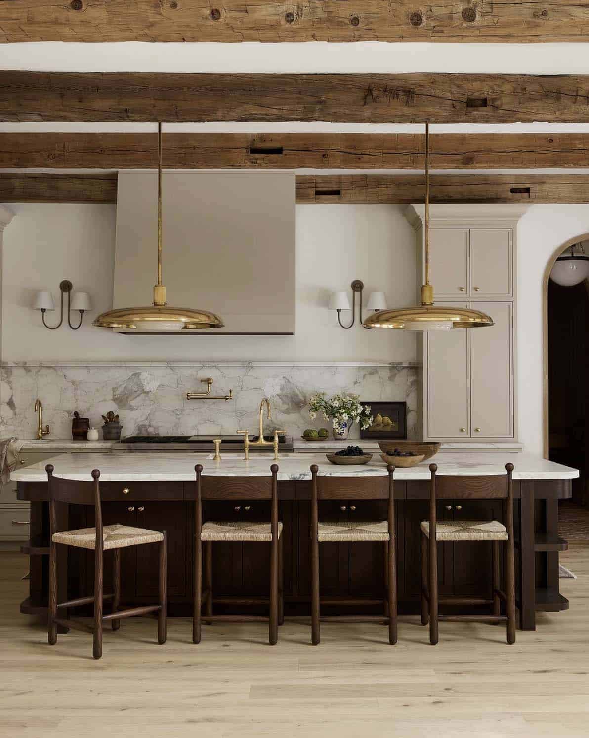transitional style kitchen with wood beams on the ceiling