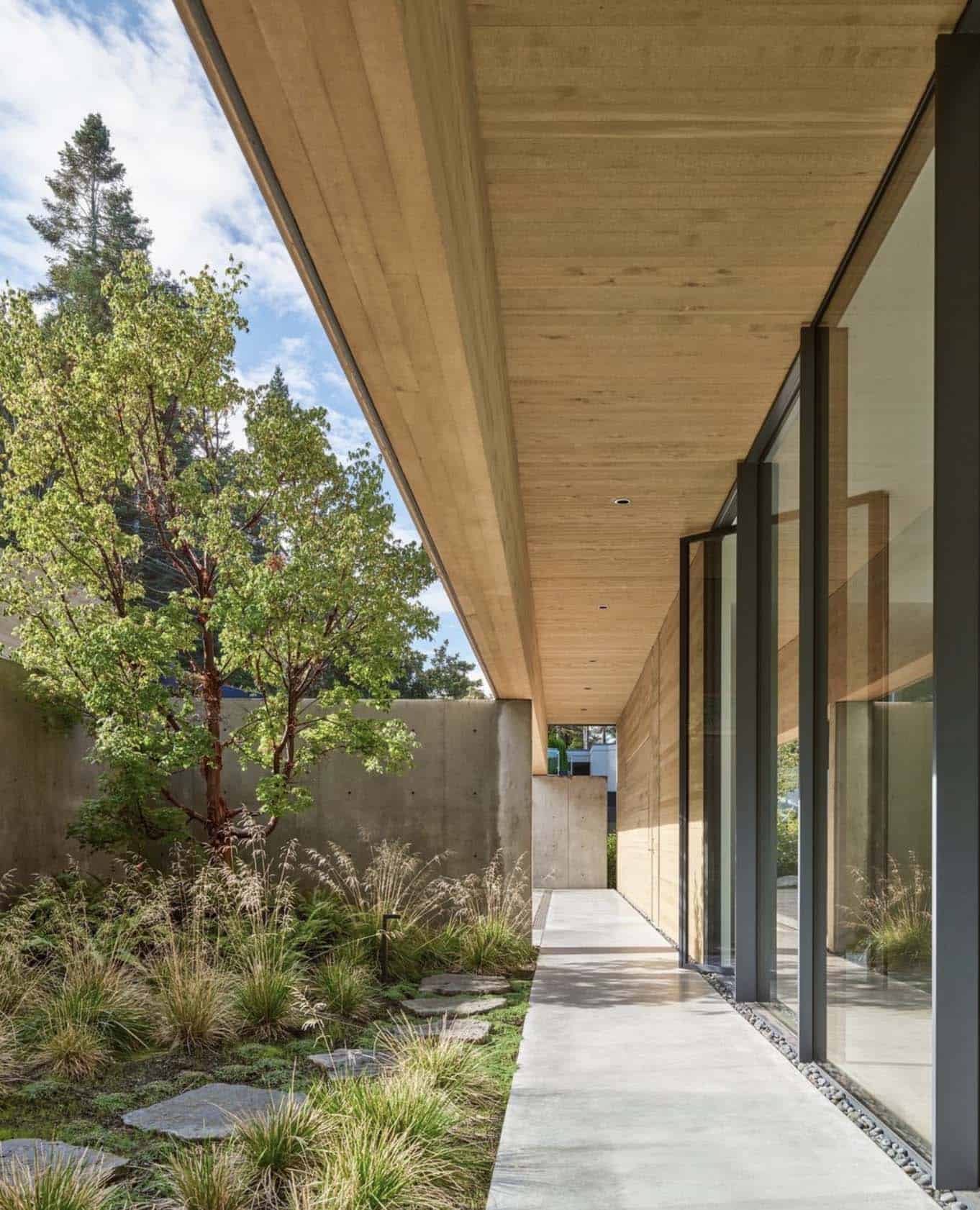 minimalist home exterior with a covered outdoor walkway