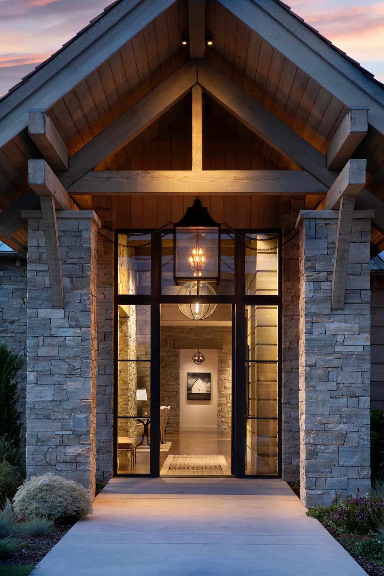 rustic mountain home exterior entry at dusk