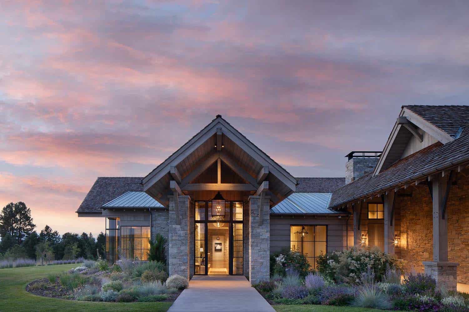 rustic mountain home exterior entry at dusk