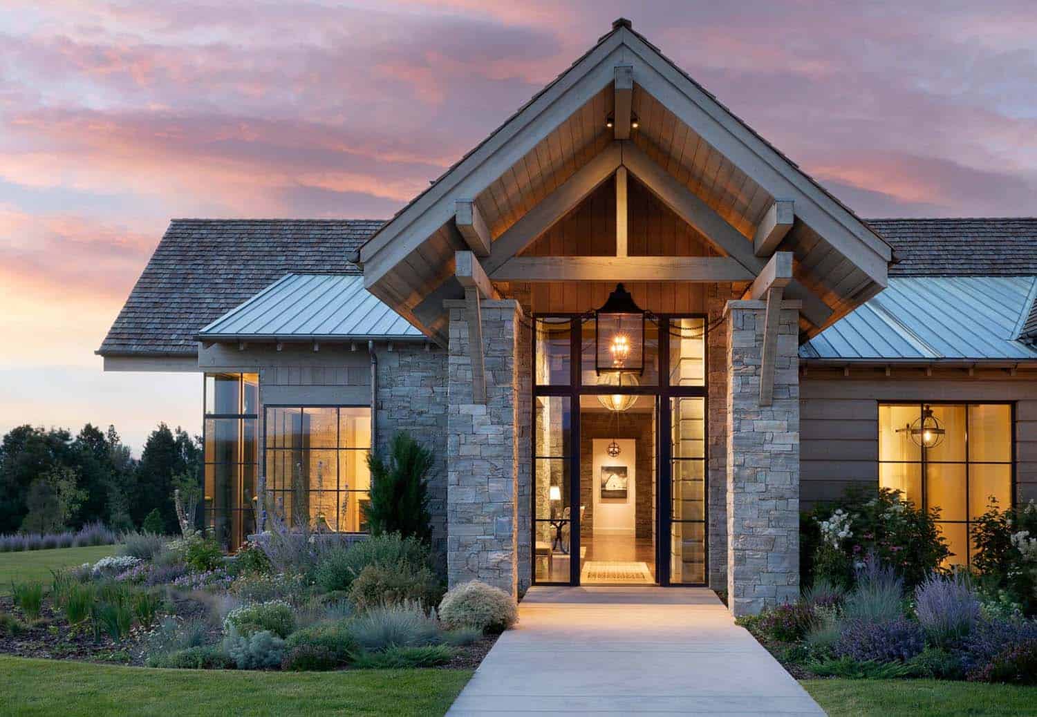 rustic mountain home exterior entry at dusk