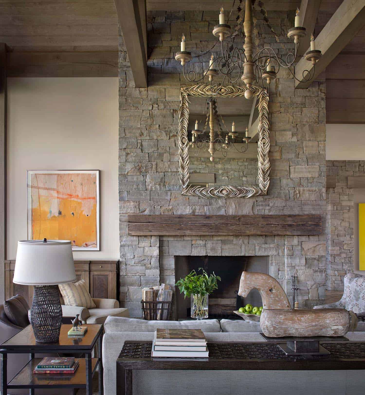 modern rustic living room with a stone fireplace
