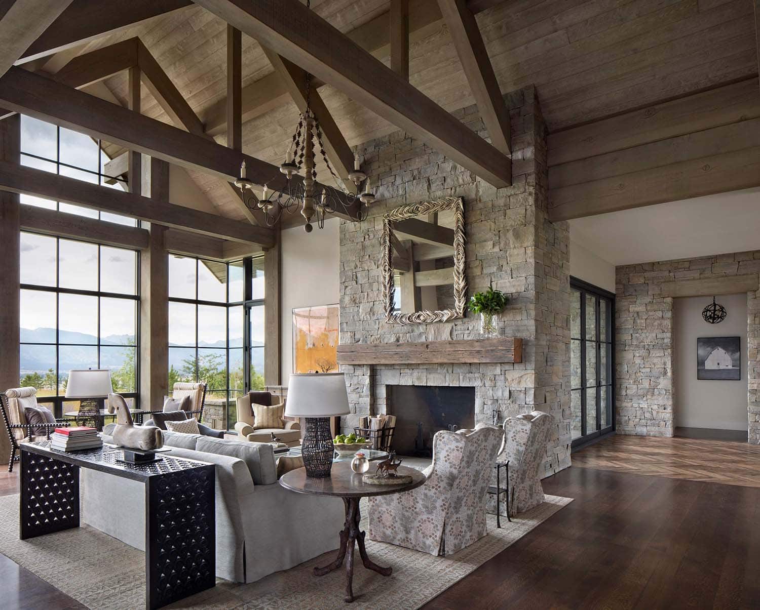 modern rustic living room with a stone fireplace