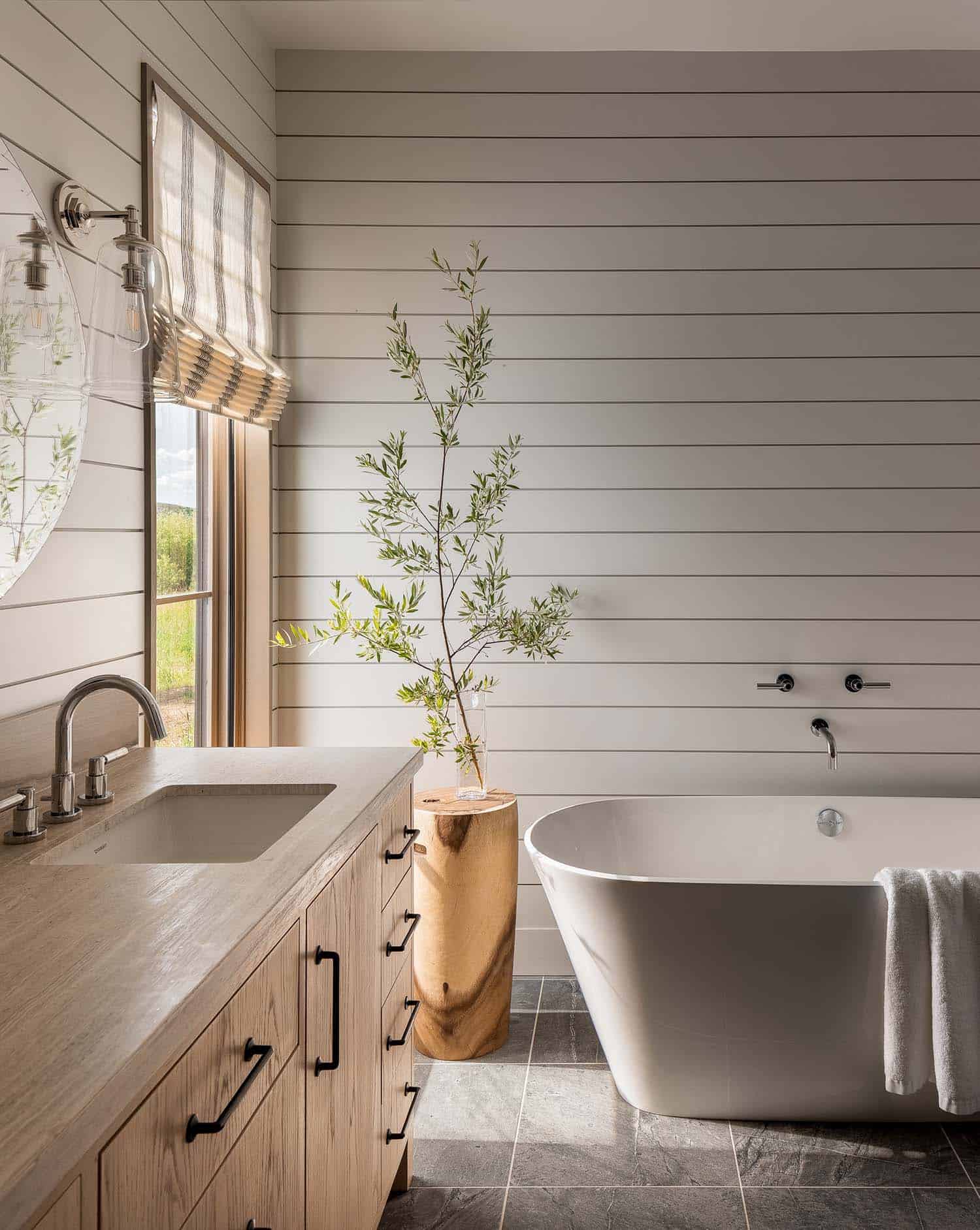 modern rustic bathroom vanity and freestanding tub