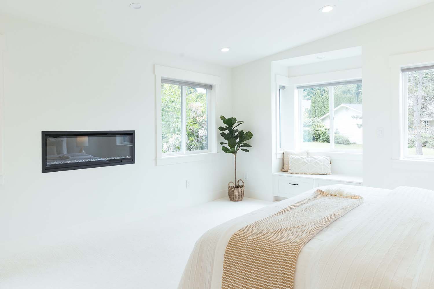modern bedroom with a fireplace