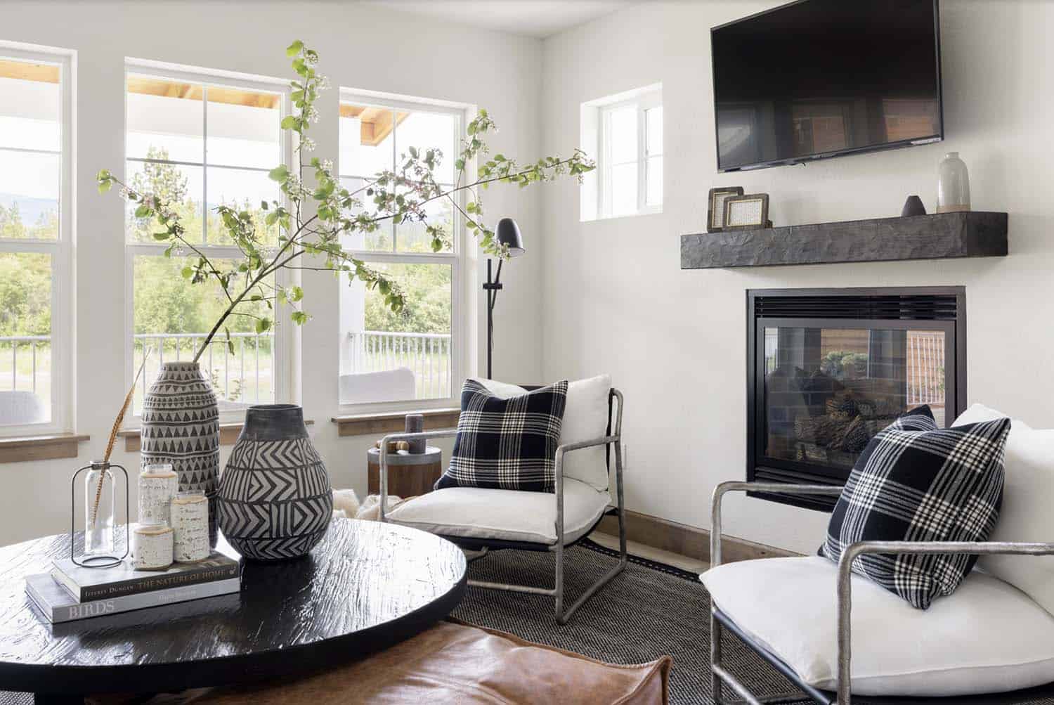 scandinavian style living room with a fireplace
