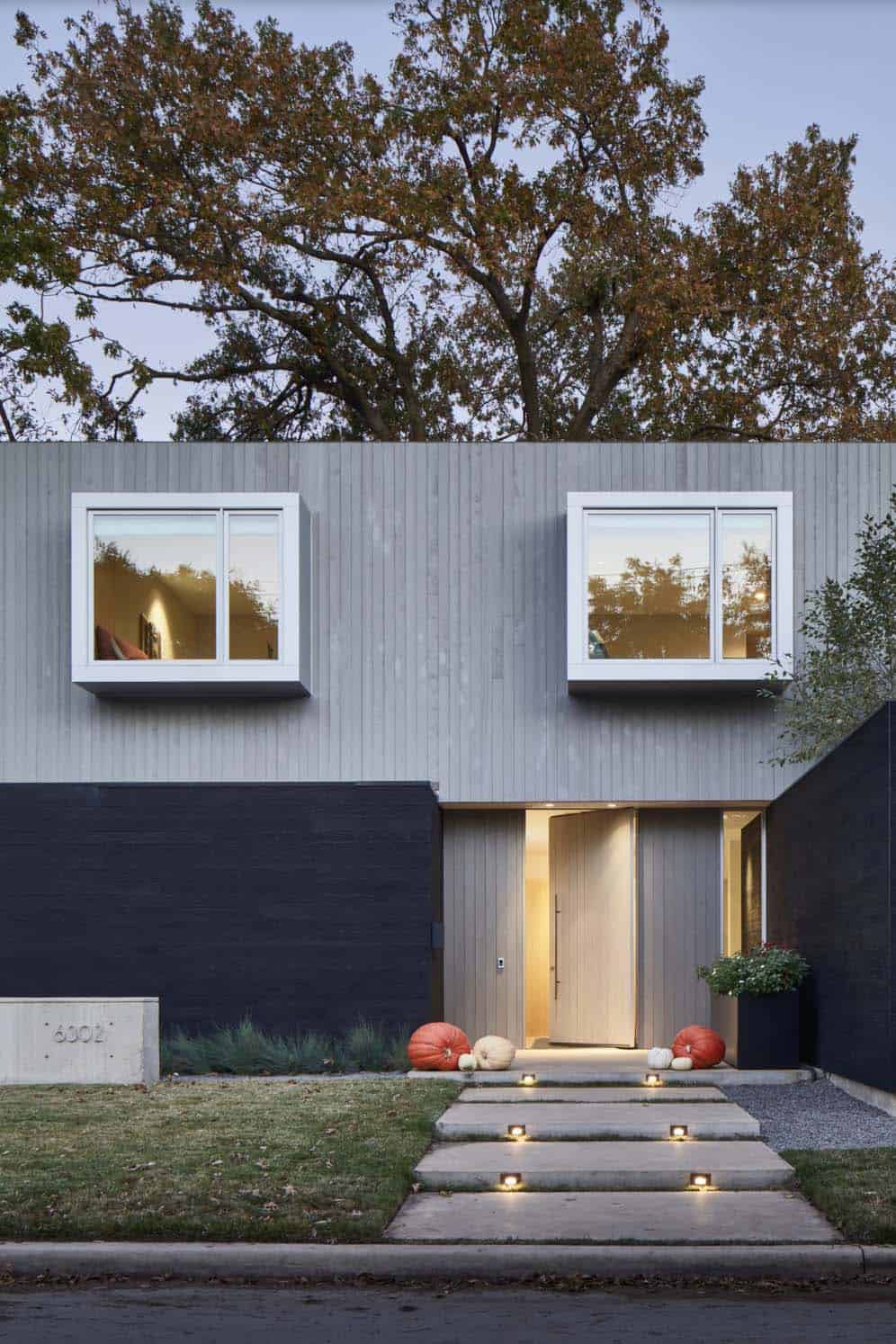 modern home exterior at dusk