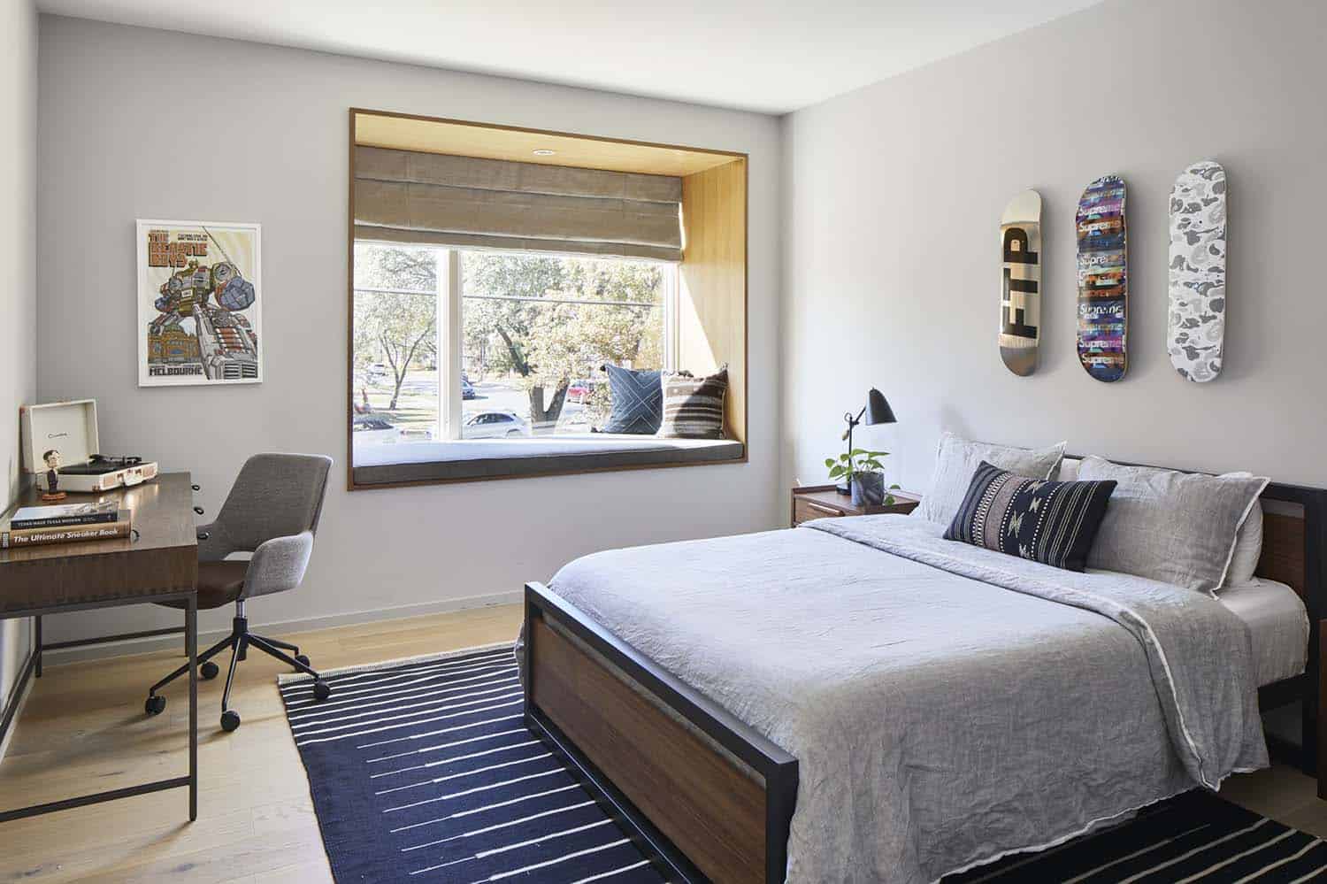modern kids bedroom with a window seat