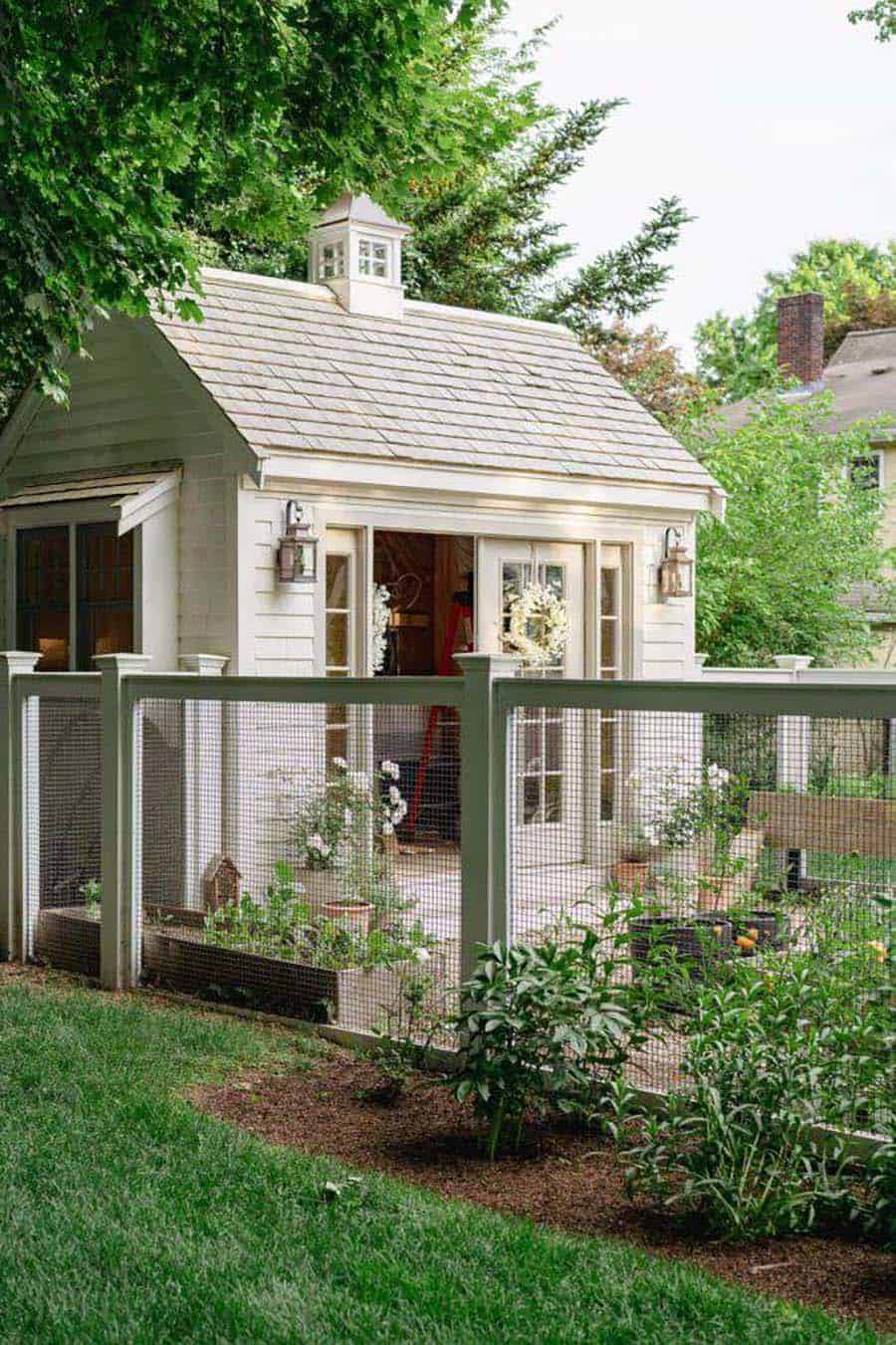she shed greenhouse with a garden