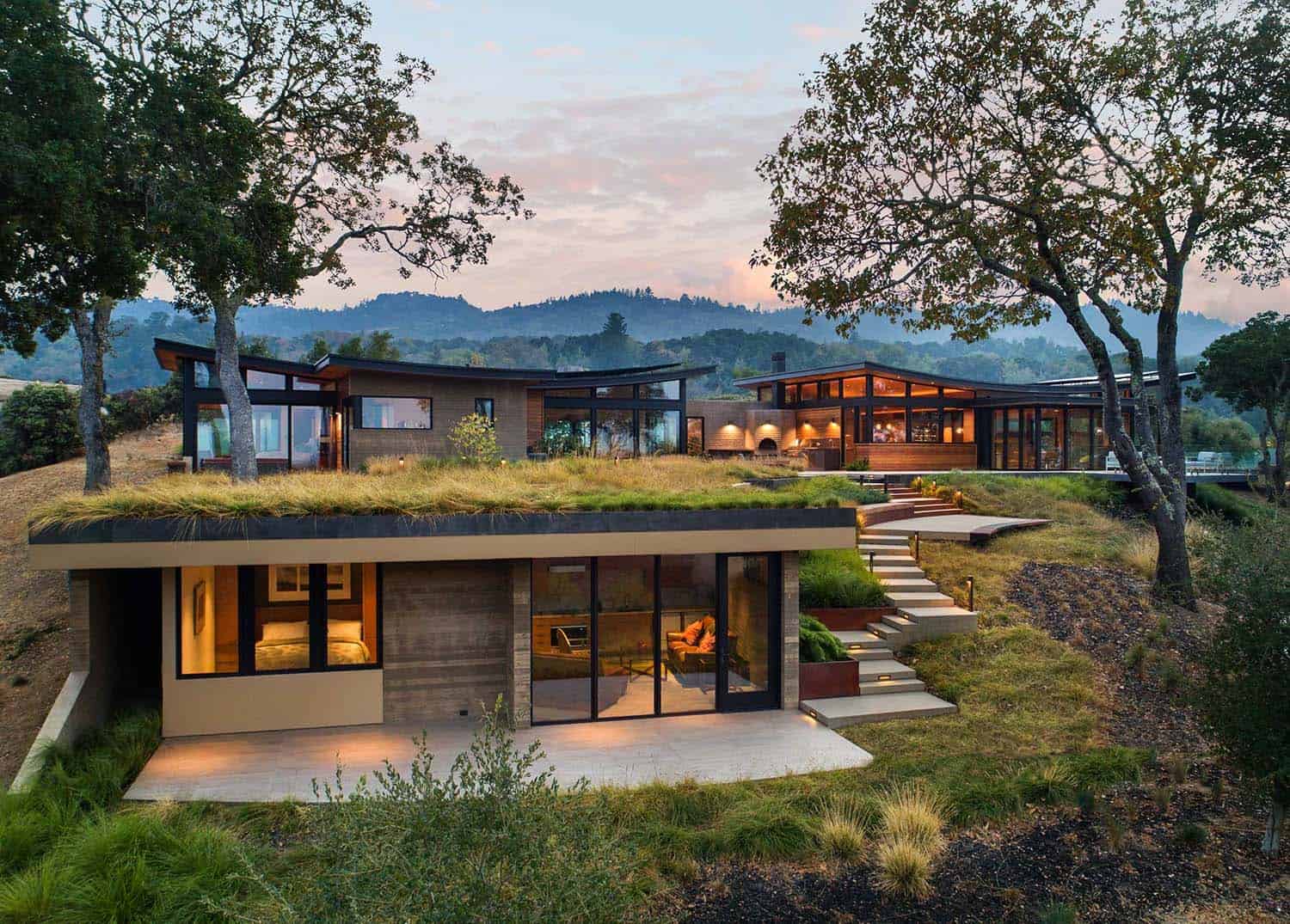 midcentury home exterior at dusk