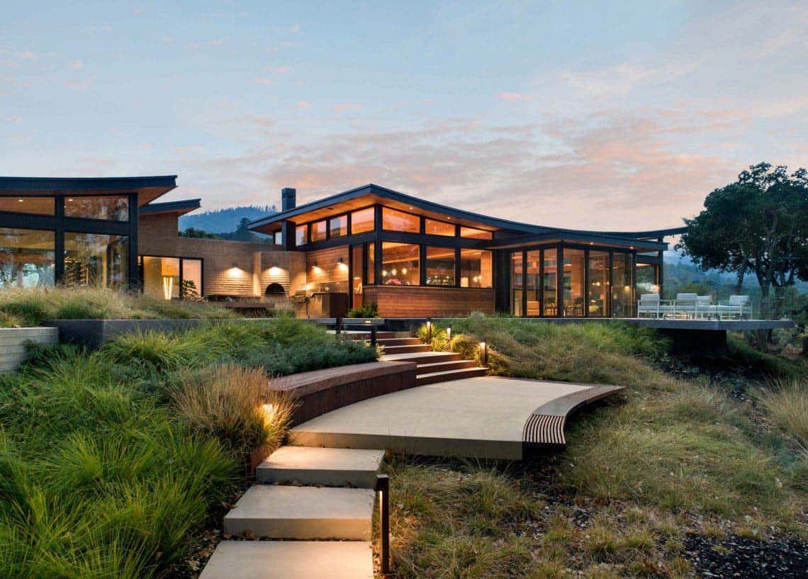 midcentury home exterior at dusk
