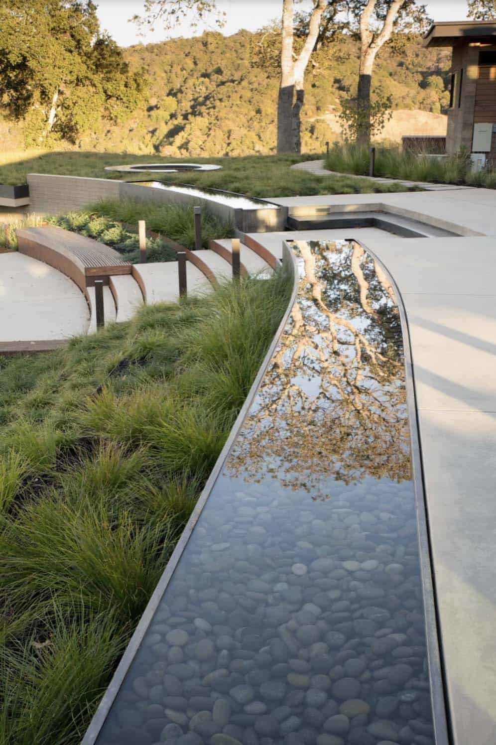 midcentury patio with a water feature