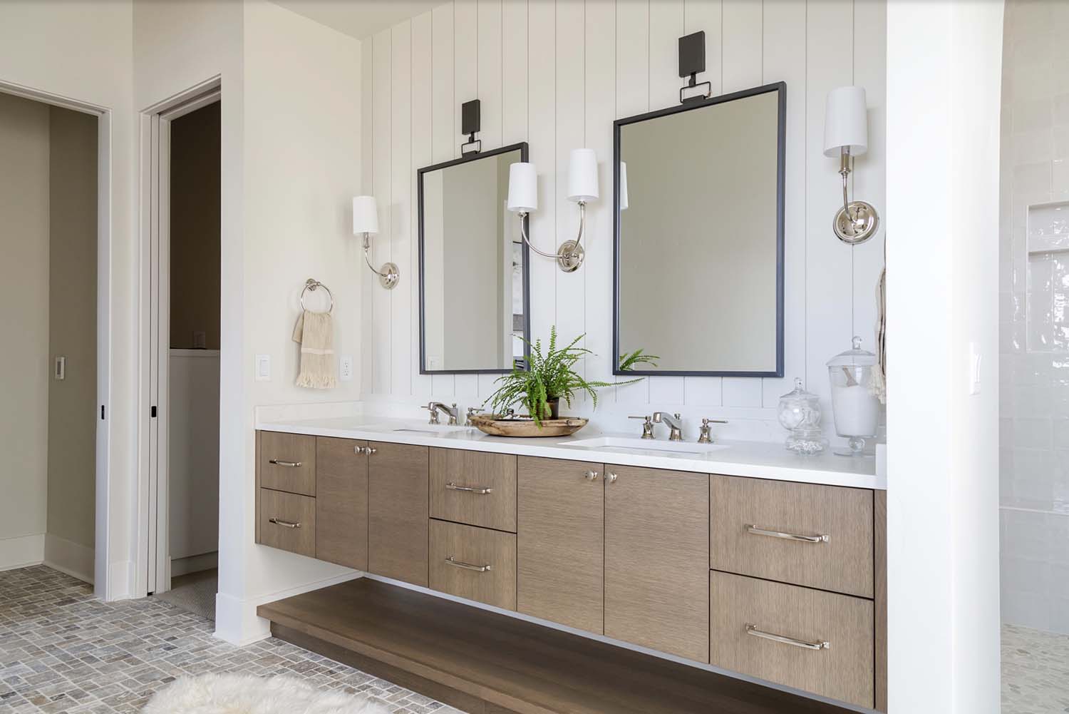 farmhouse style bathroom with a vanity