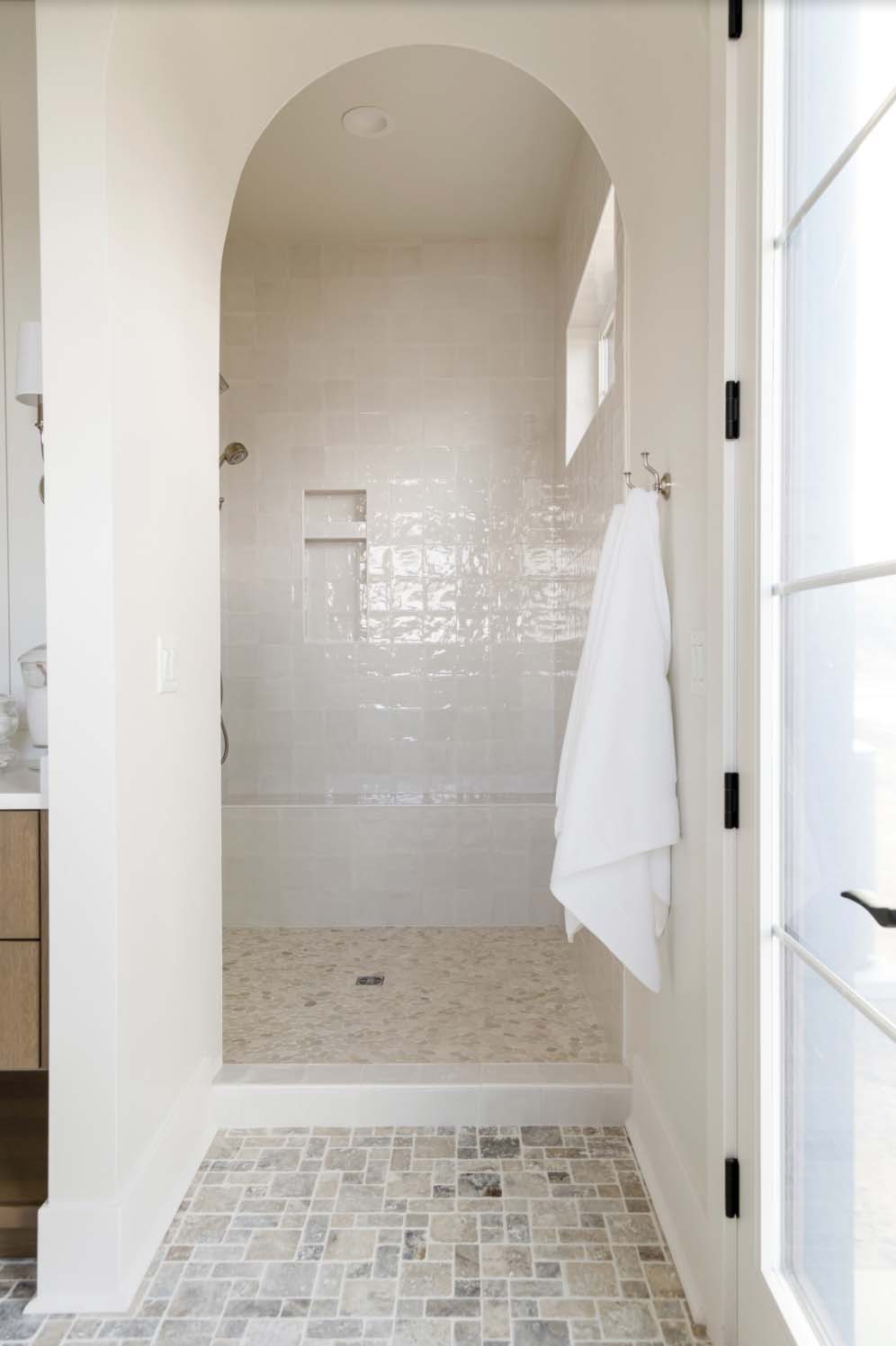 farmhouse style bathroom with a shower