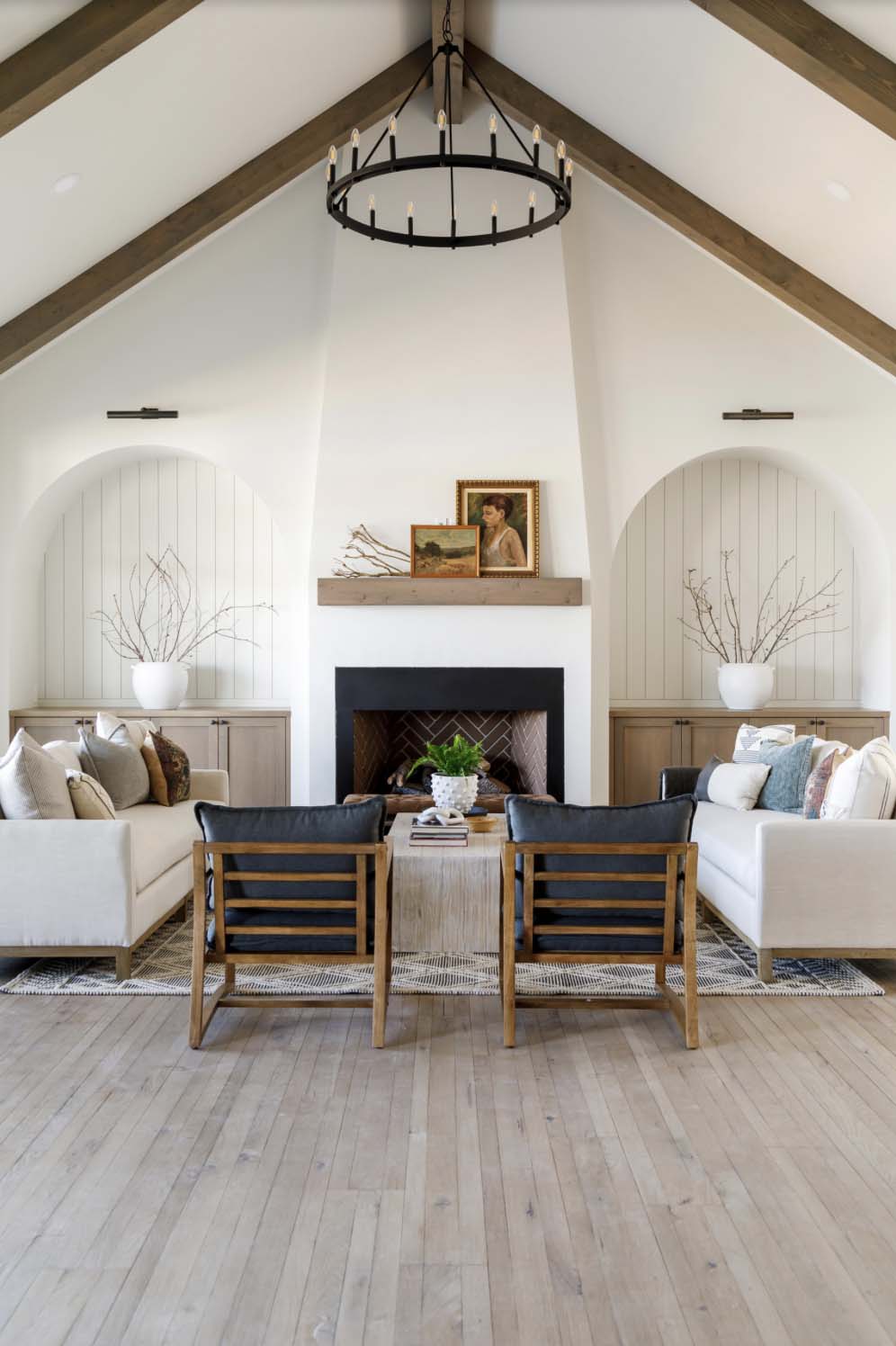 farmhouse style living room with a fireplace