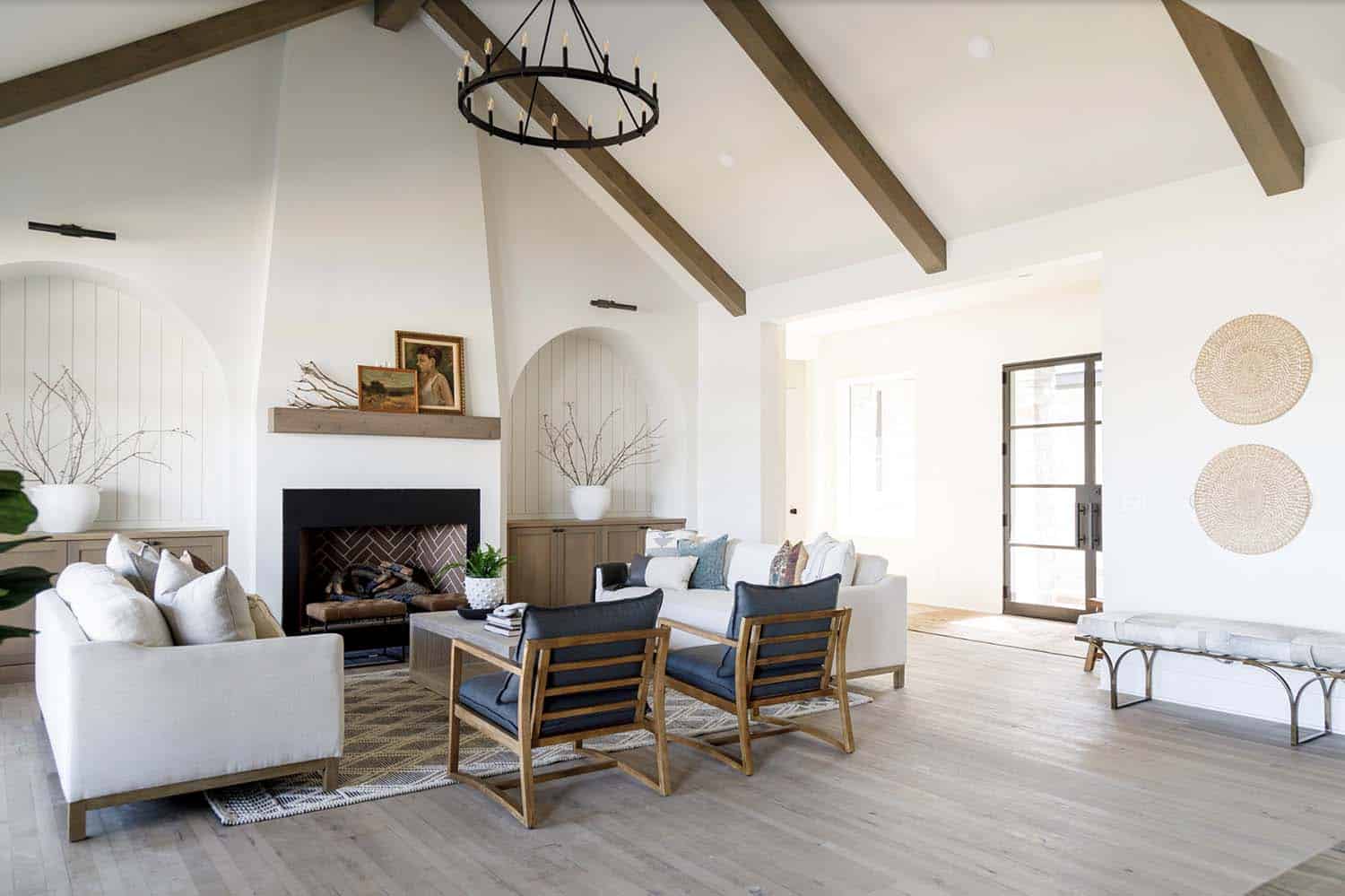 farmhouse style living room with a fireplace