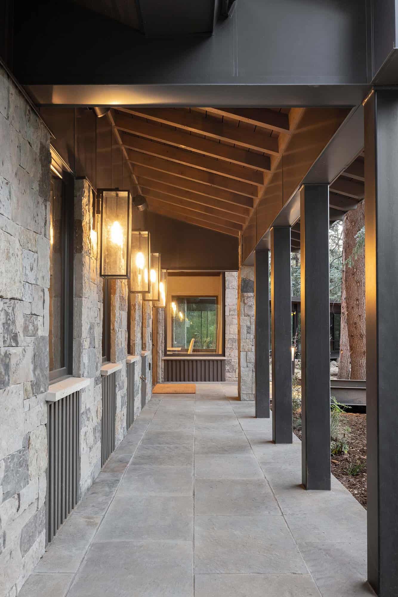 modern rustic mountain home exterior with a covered porch