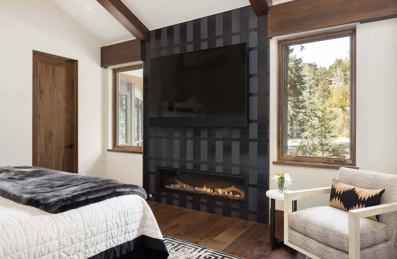 modern bedroom with a fireplace