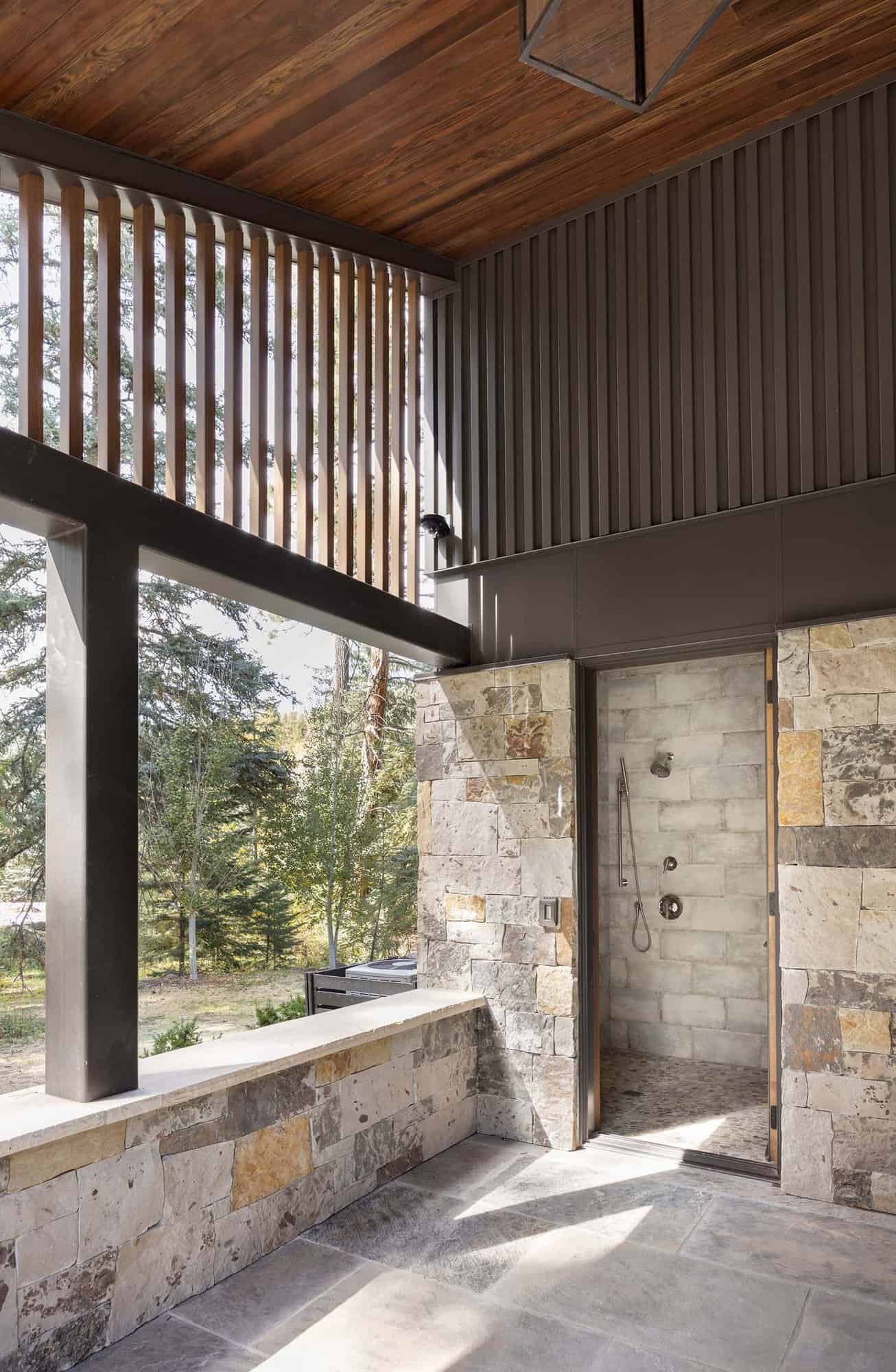 modern covered patio with an outdoor shower