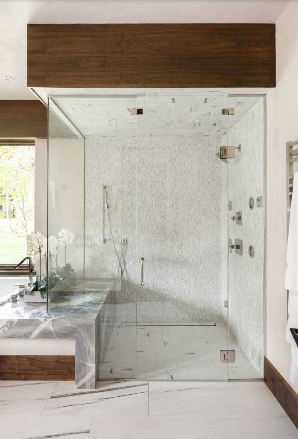 modern bathroom with a glass enclosed shower