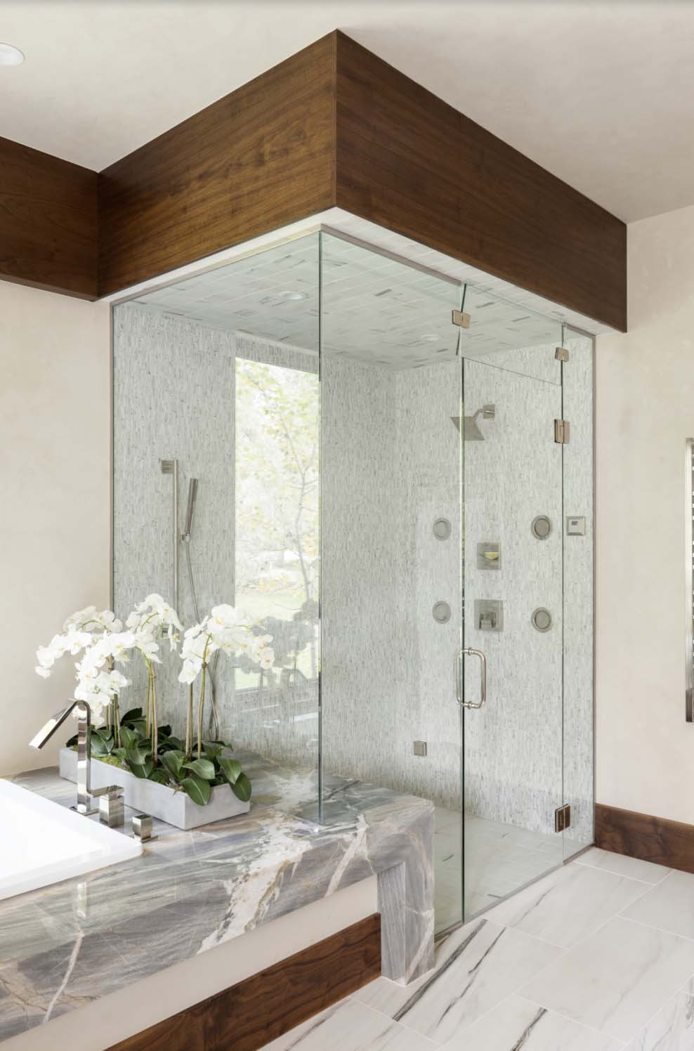 modern bathroom with a glass enclosed shower