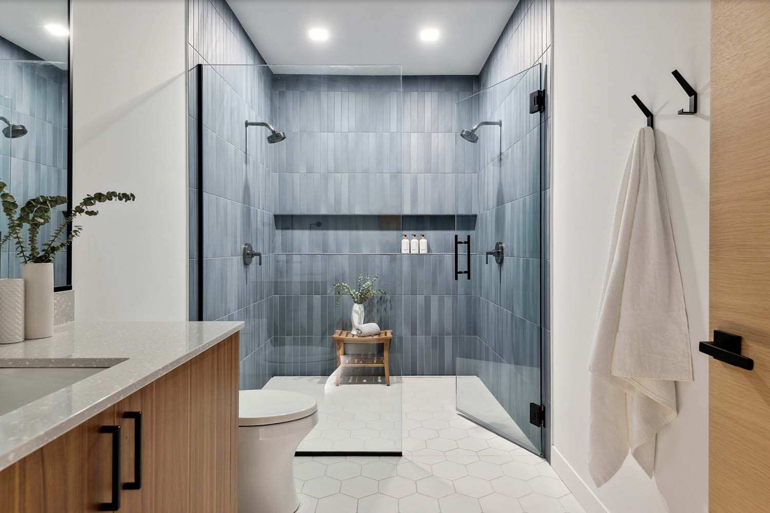 modern bathroom vanity with a shower