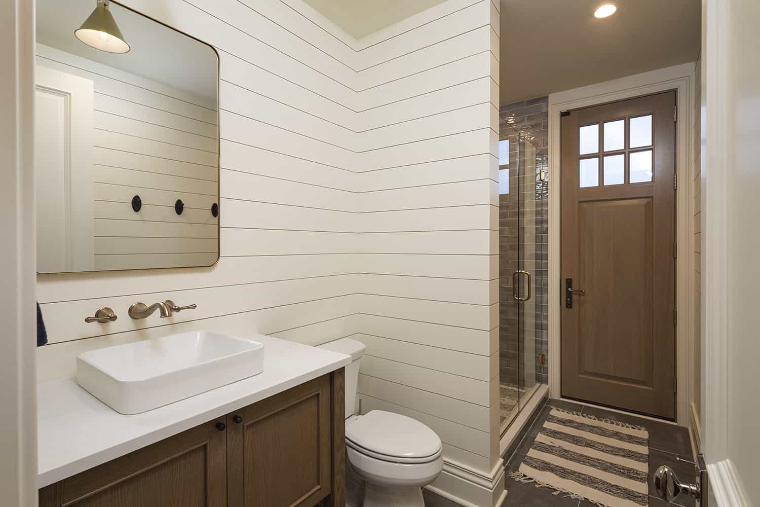 transitional style lower level bathroom