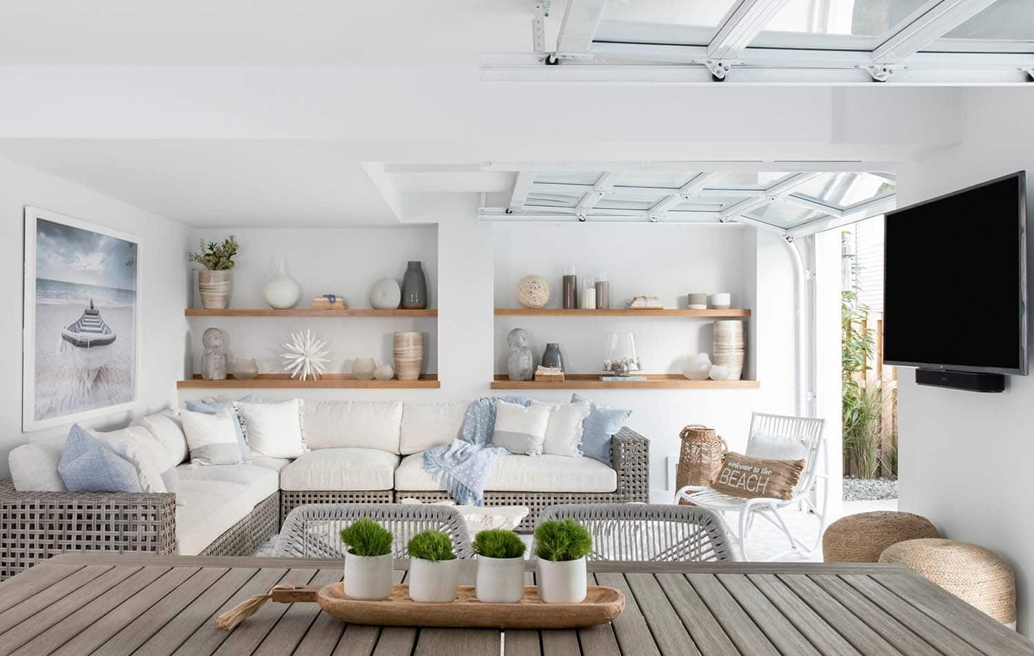 beach-style pool house with a lounge